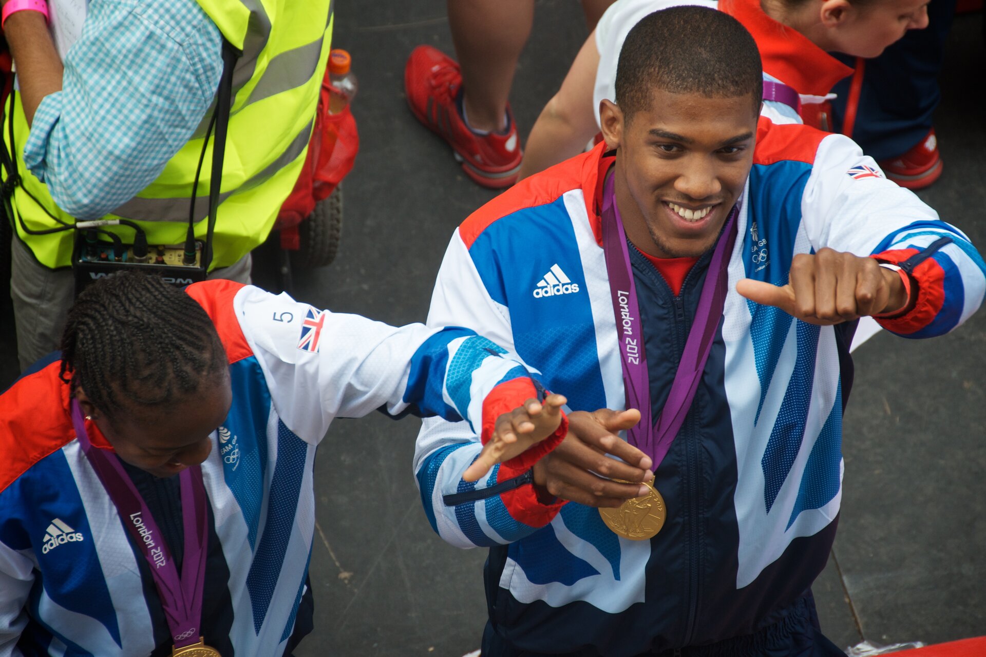 Anthony Joshua celebrating with Olympic gold medal after winning the super-heavyweight boxing title at London 2012