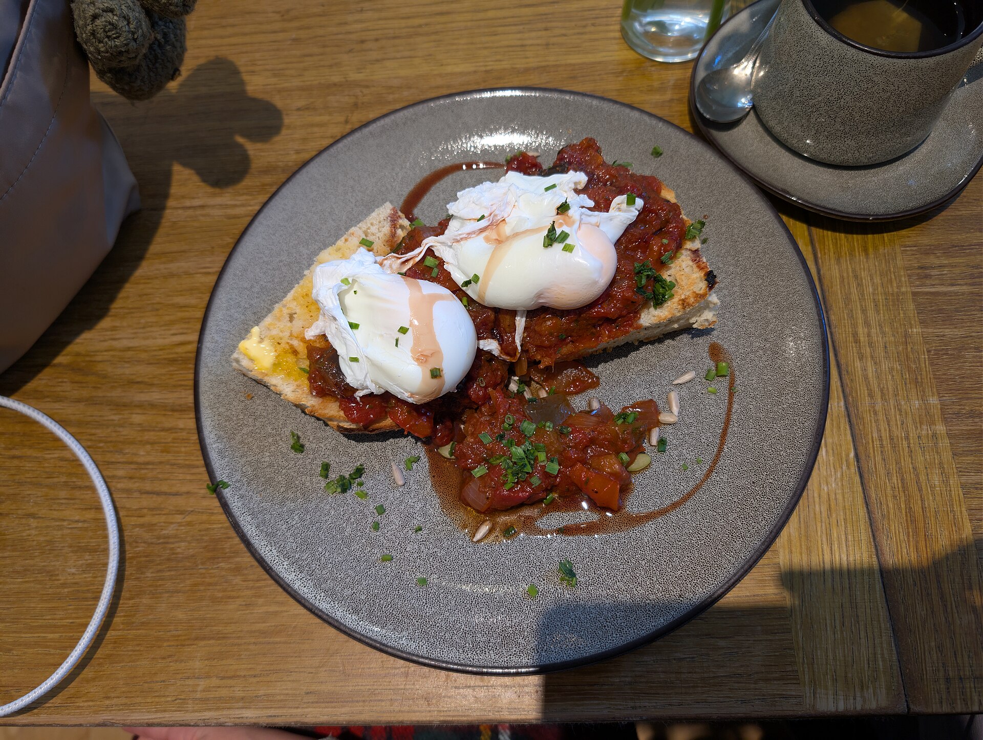 Shakshuka with poached eggs and tomato sauce, a popular brunch dish served across Riyadh