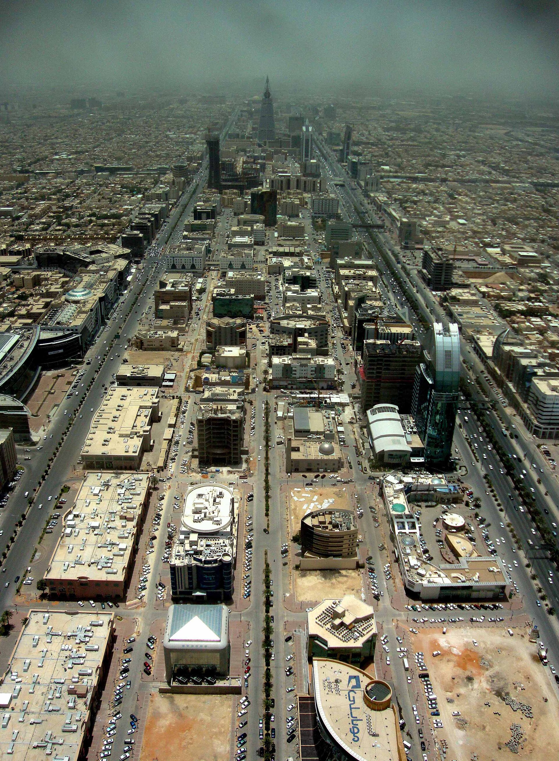 Aerial view of Riyadh looking south from the Kingdom Centre Sky Bridge, showing King Fahd Road stretching into the distance