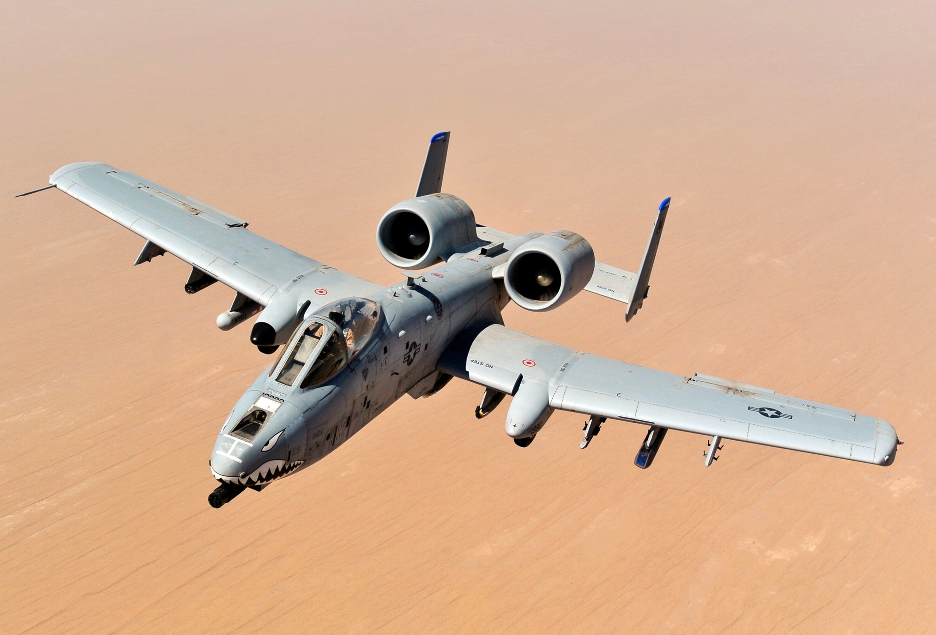 A-10C Thunderbolt II in flight showing the GAU-8/A Avenger cannon nose — the 30mm rotary gun fires 3,900 rounds per minute, originally designed for Soviet tank formations and now hunting IRGC fast-attack craft in the Strait of Hormuz