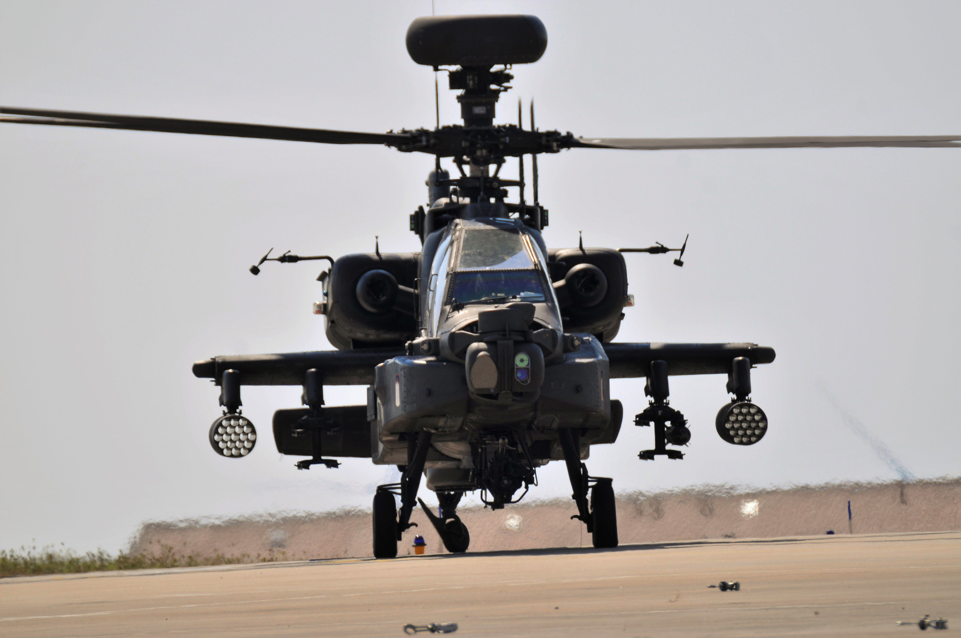 AH-64 Apache attack helicopter head-on with Hellfire missile pods — CENTCOM released Apache patrol imagery over the Strait of Hormuz on April 18, 72 hours before the April 22 ceasefire expiry