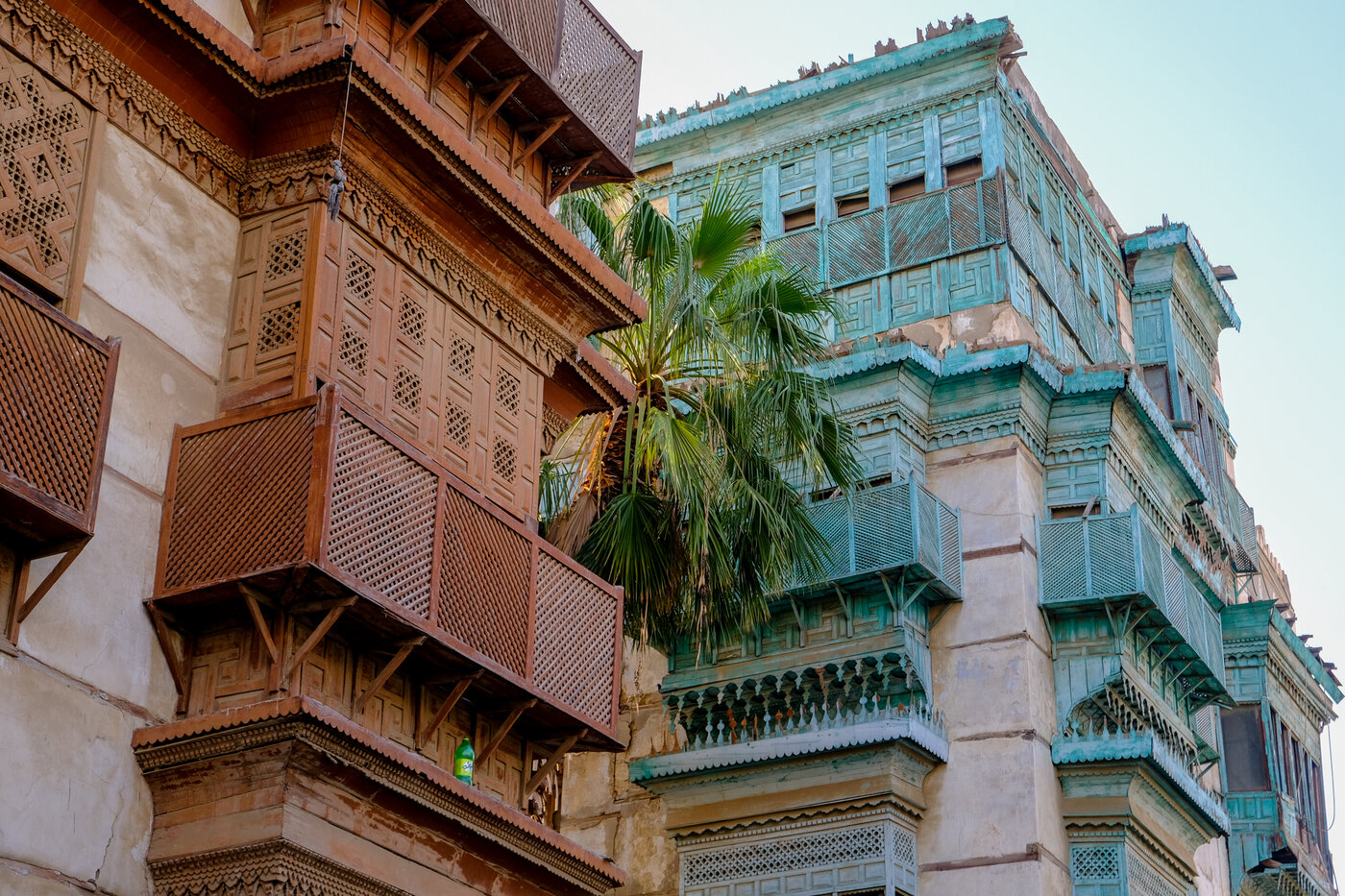 Traditional Hejazi architecture with ornate wooden mashrabiya screens in the Al-Balad historic district of Jeddah