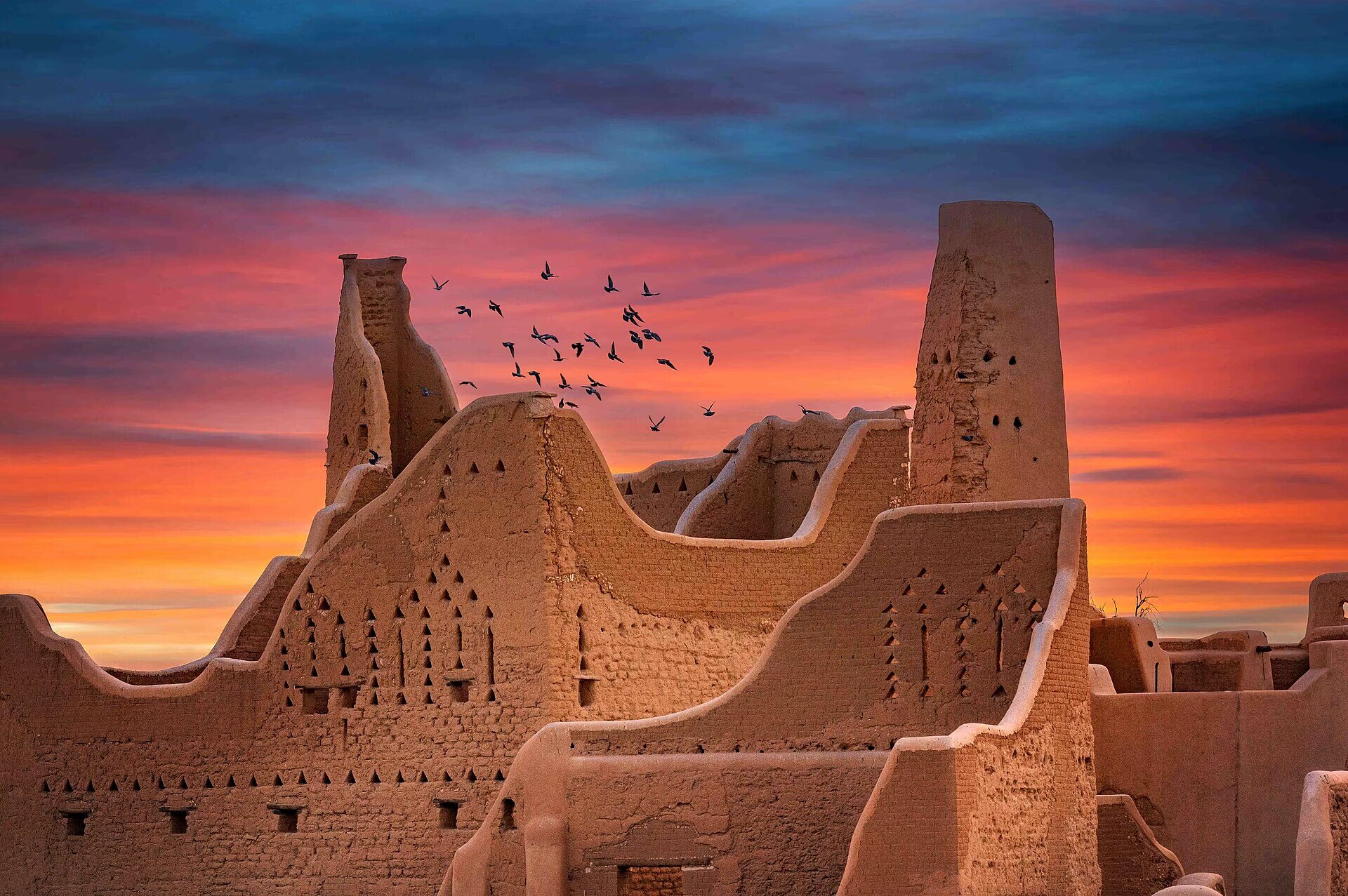 The At-Turaif District of Diriyah at sunset, a UNESCO World Heritage Site with traditional Najdi mud-brick architecture