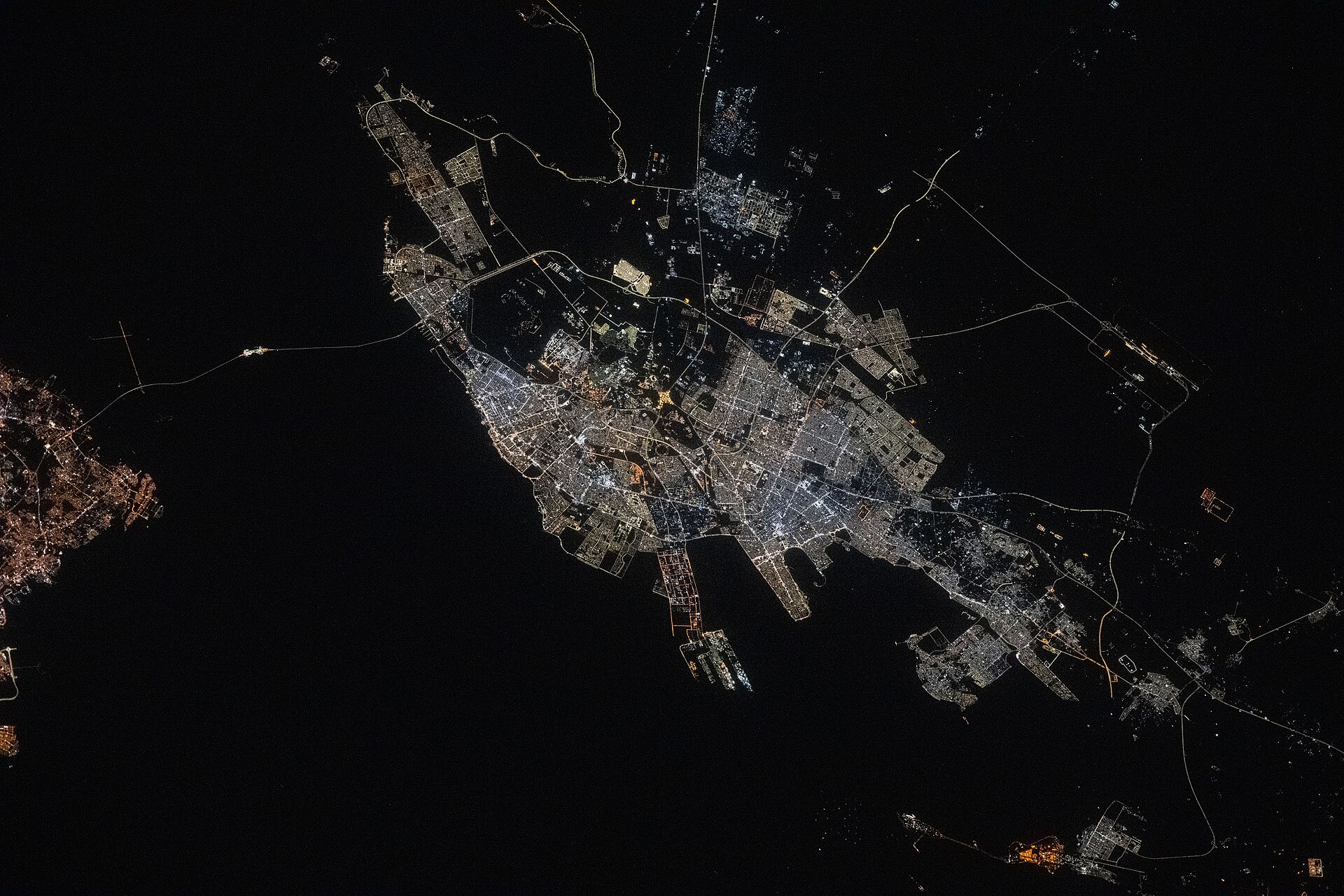 Aerial view of Dammam and the Eastern Province at night, photographed from the International Space Station