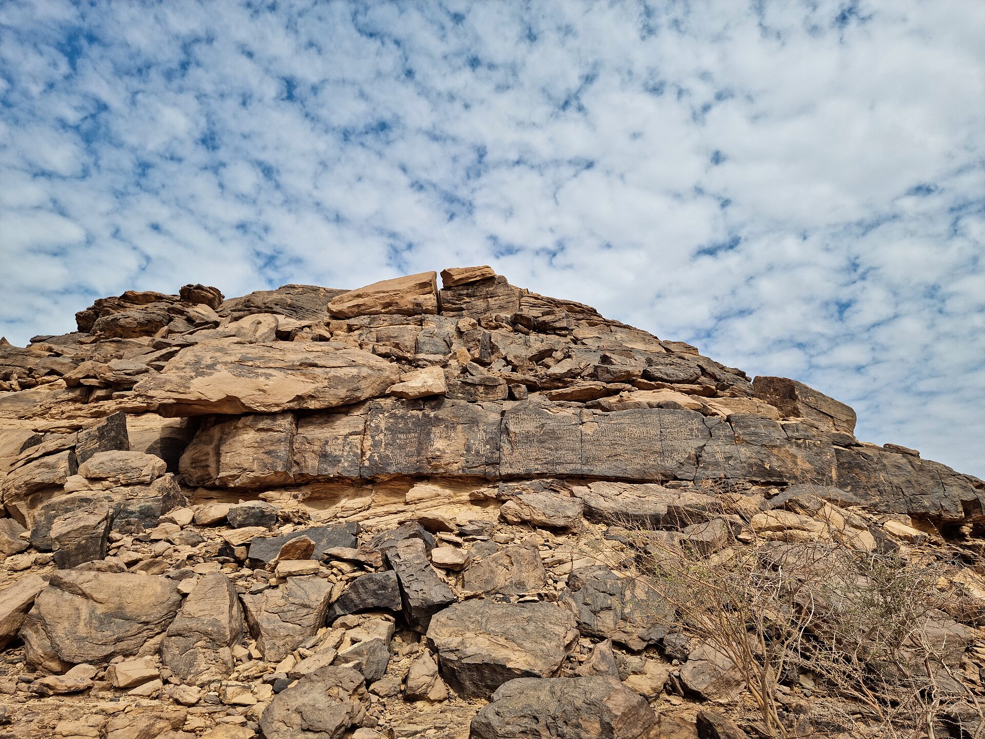 Rocky outcrop at Hima Cultural Area near Najran showing the arid mountain landscape where ancient rock art is found