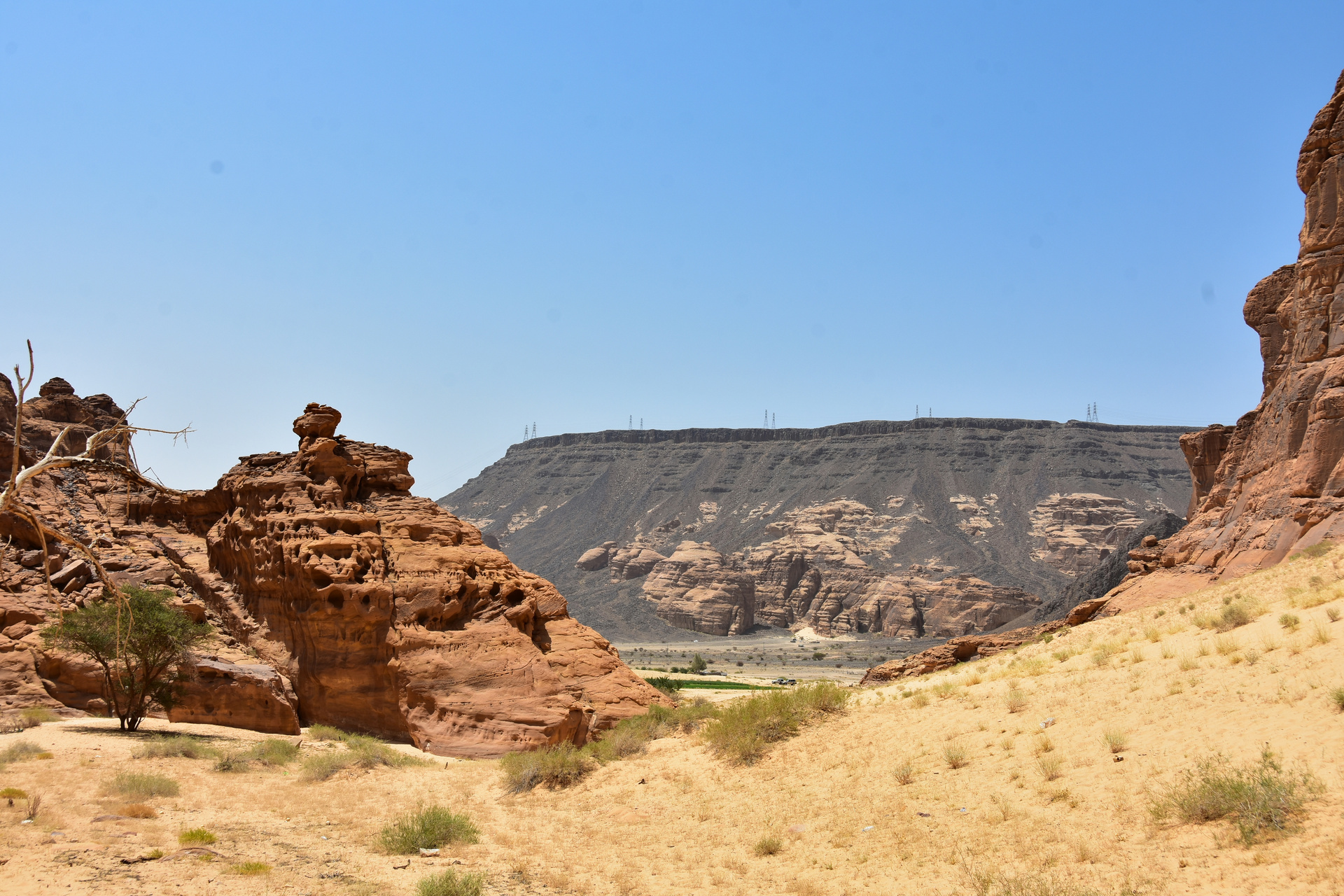 Sandstone rock formations and desert landscape in AlUla, northwestern Saudi Arabia