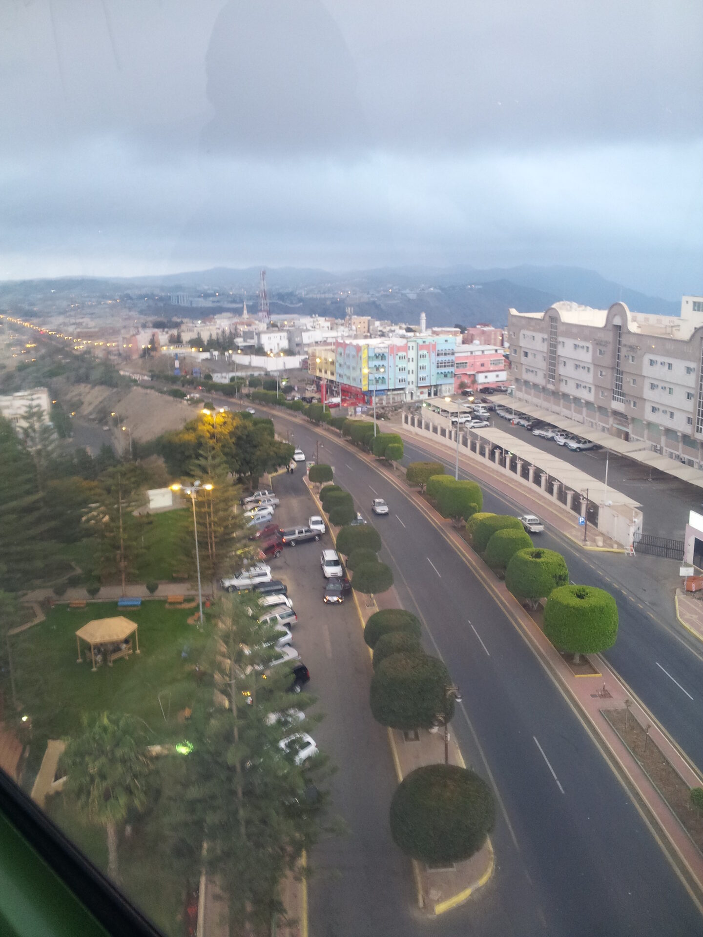 Panoramic view of Abha city and the Asir mountains shrouded in mist