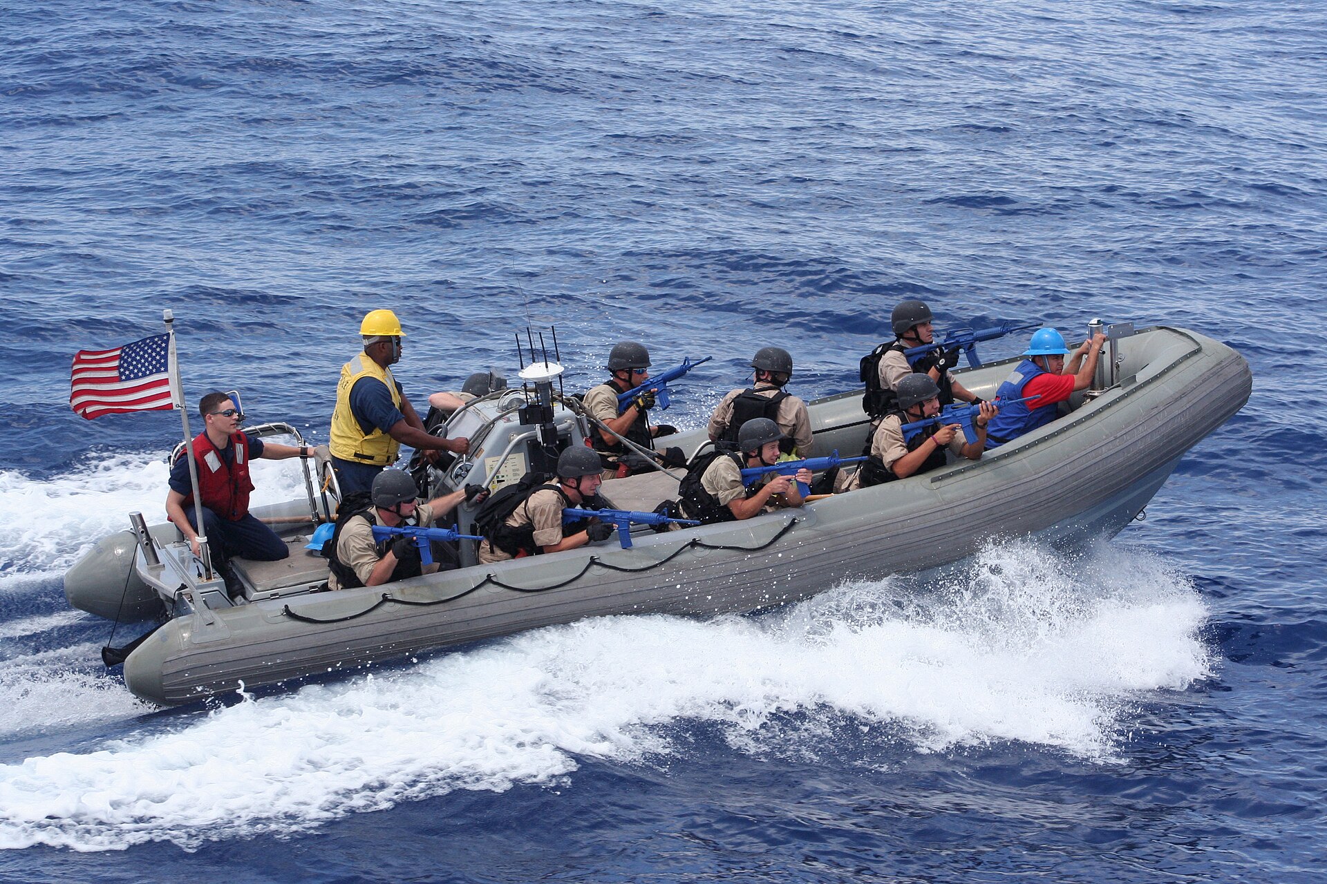 US Navy Vessel Boarding Search and Seizure team approaches a suspicious vessel during a maritime interdiction operation, the same capability used to board the Majestic X and Tifani in the Indian Ocean