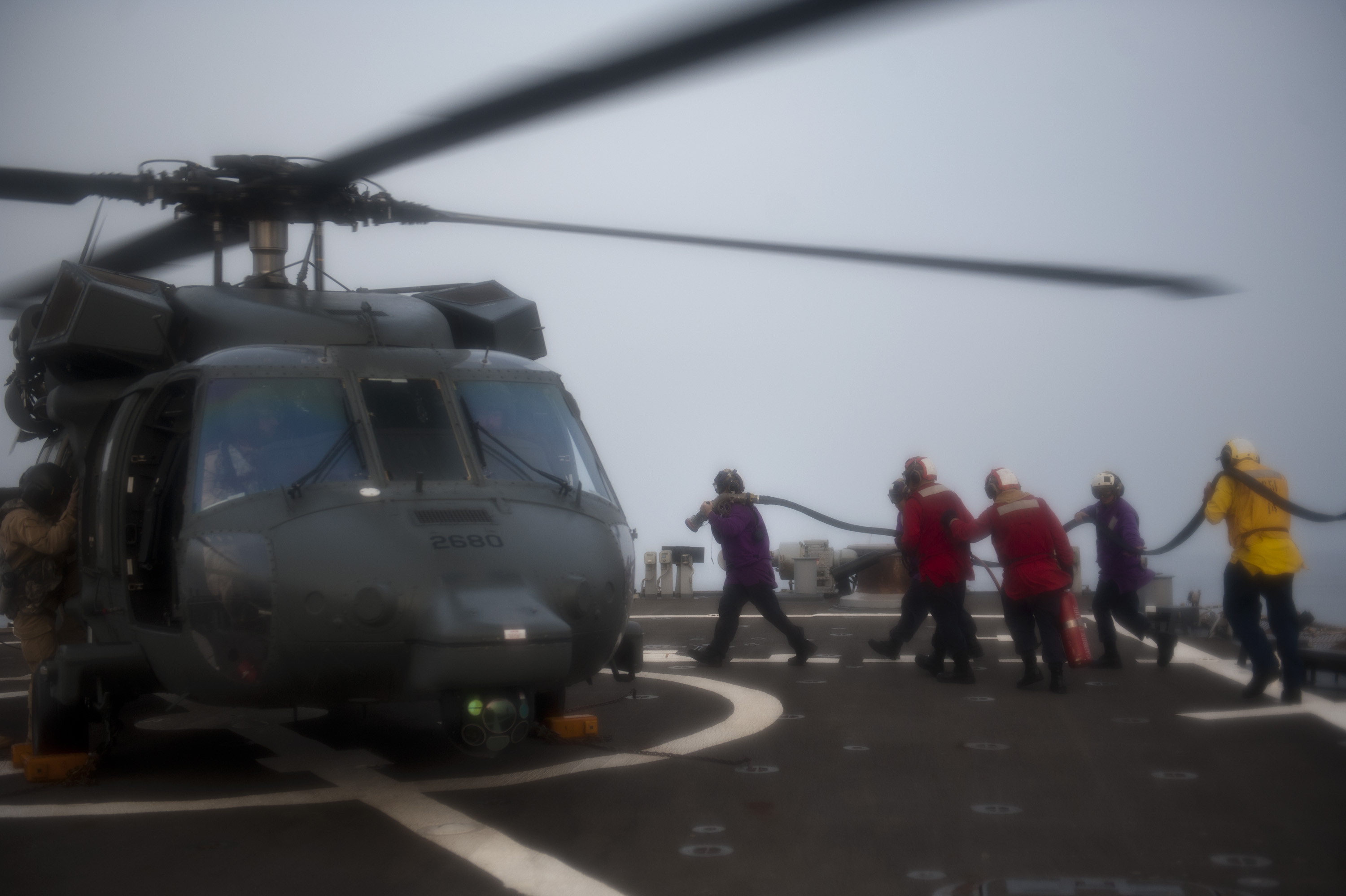 USS Arleigh Burke (DDG 51) in the Persian Gulf, April 2014 — US naval assets in Gulf waters provide the military pressure track behind the coordinated Gulf-state diplomatic accountability campaign against Baghdad