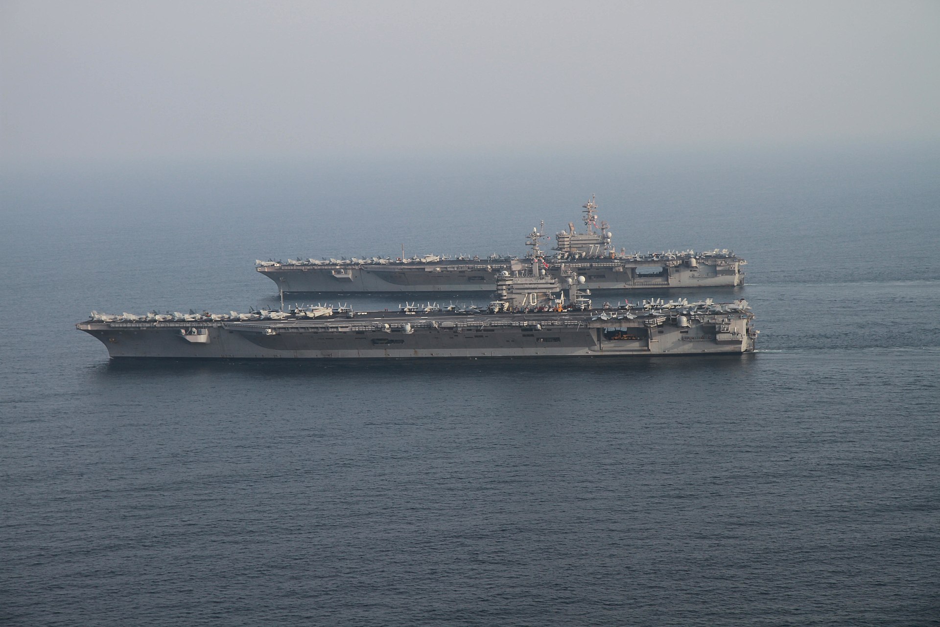 Two US Navy aircraft carrier strike groups operating together in the Persian Gulf — USS Carl Vinson (CVN 70) and USS George H.W. Bush (CVN 77), October 2014
