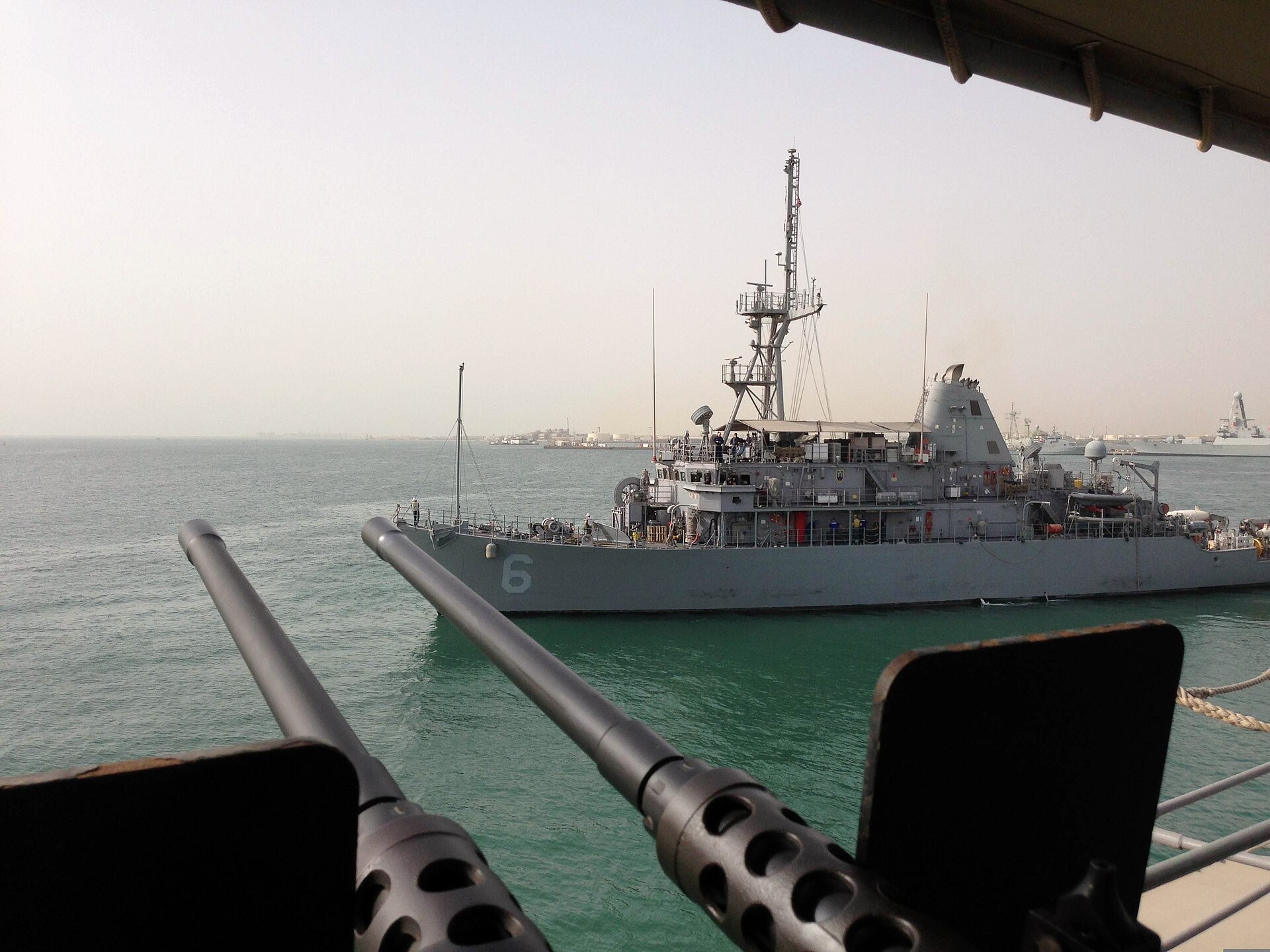 USS Devastator MCM-6 Avenger-class minesweeper departing Mina Salman Pier Bahrain for mine countermeasures exercise