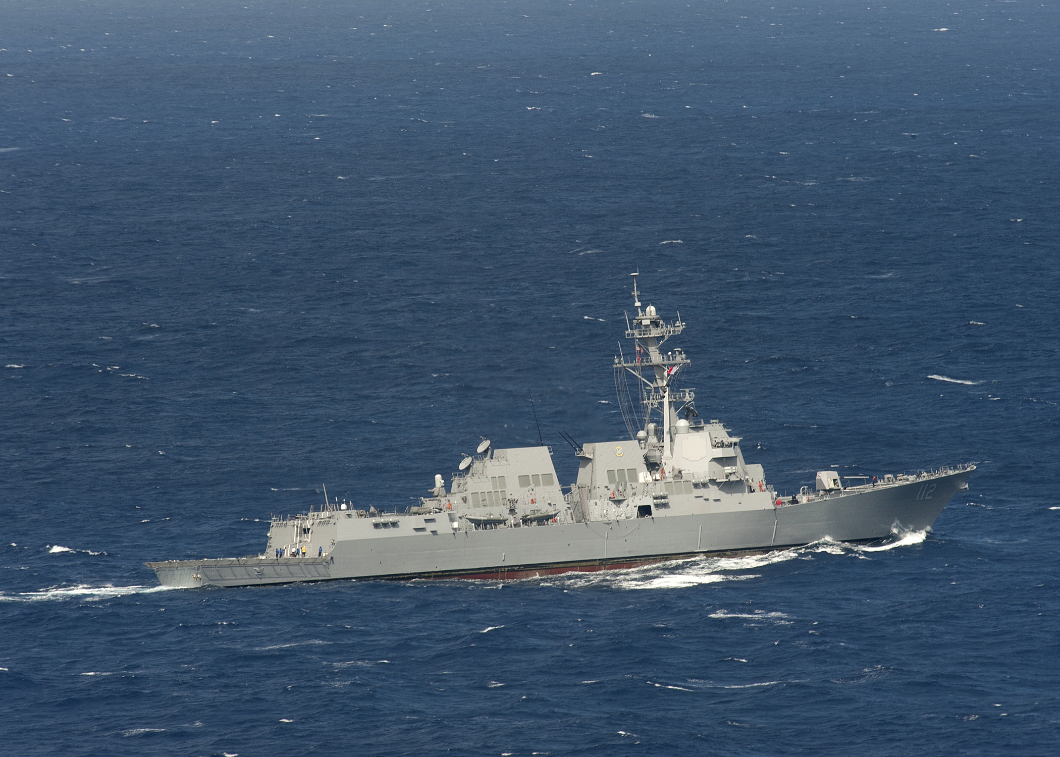 USS Michael Murphy (DDG-112), an Arleigh Burke-class guided-missile destroyer, underway off Hawaii — DDG-112 was among the CENTCOM vessels that transited the Strait of Hormuz on April 11 and received an IRGC Navy last warning radio call, which Washington dismissed as transit in accordance with international law