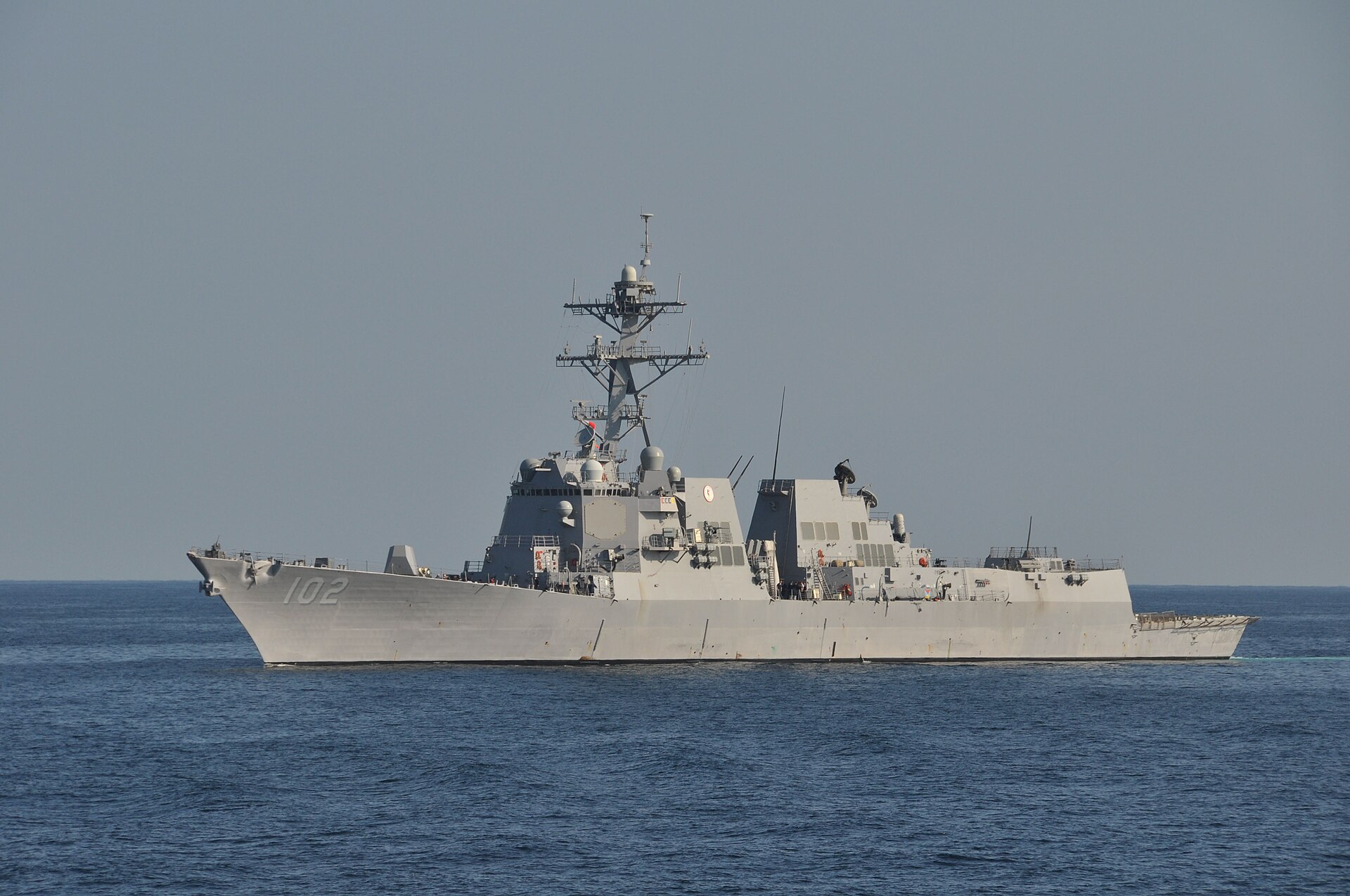 USS Sampson (DDG-102), an Arleigh Burke-class guided-missile destroyer, underway in the North Arabian Sea in the U.S. 5th Fleet area of responsibility — the same waters where CENTCOM enforces the April 13 blockade on vessels bound for Iranian ports