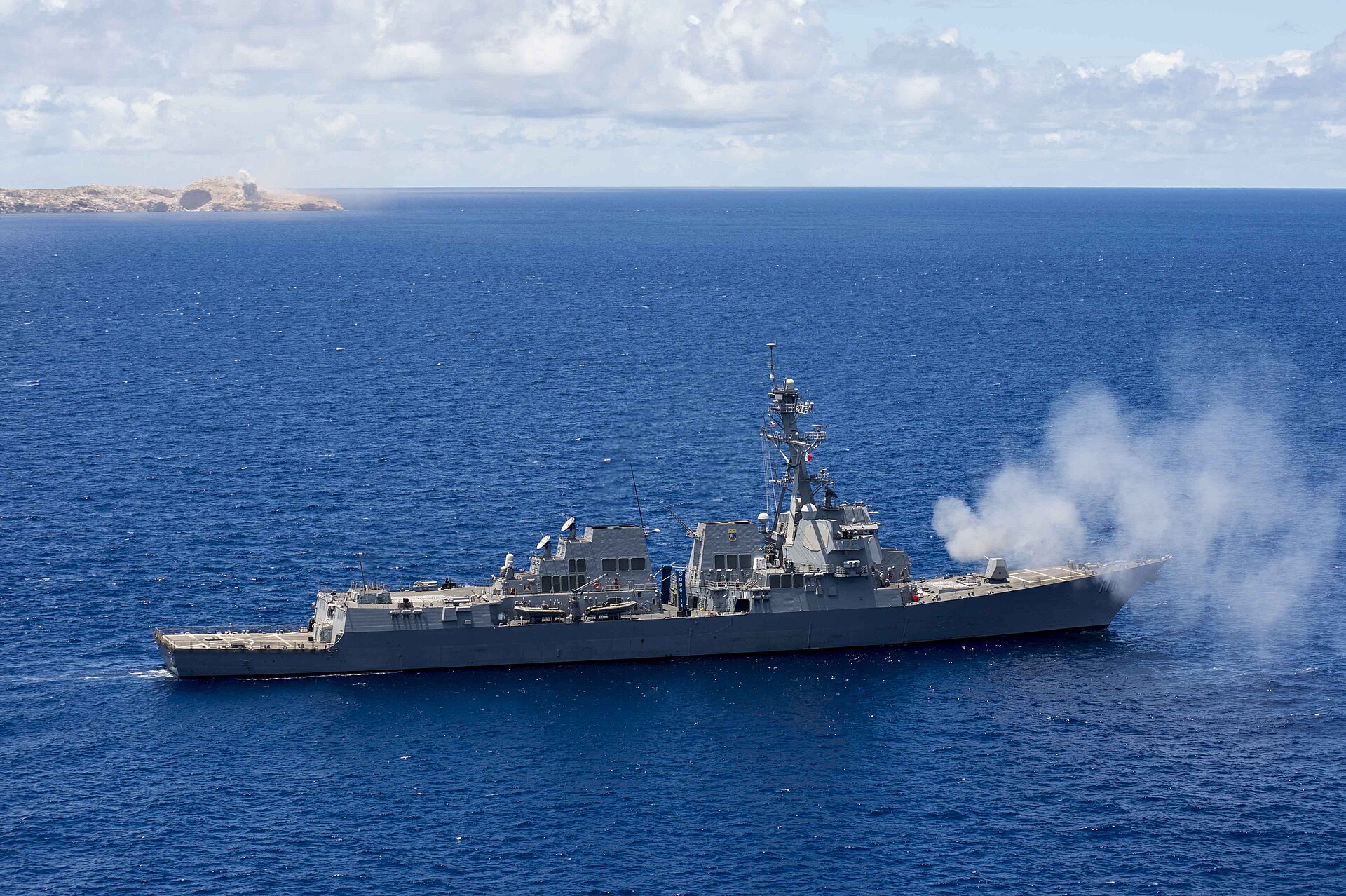 USS Spruance DDG-111 fires its Mk 45 gun during a naval exercise, Pacific Ocean, June 2016