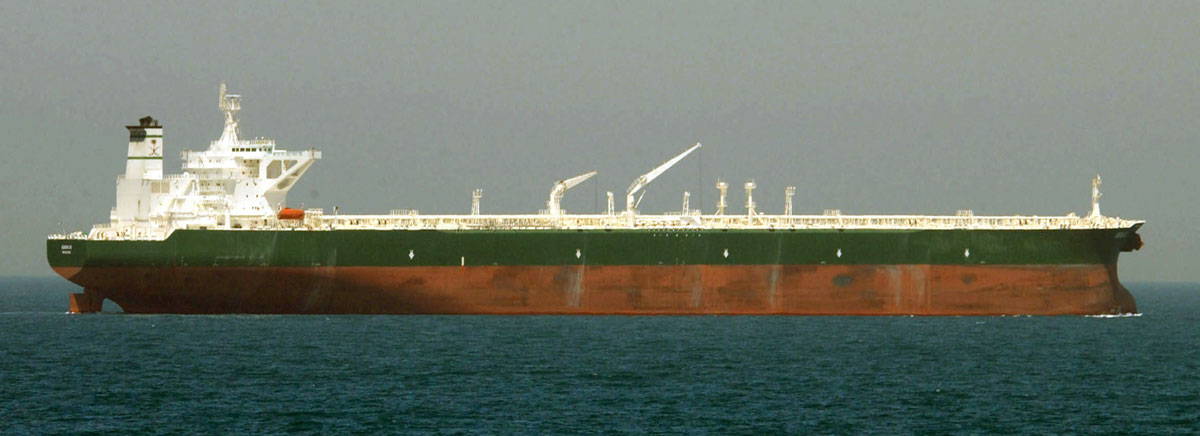 Supertanker AbQaiq fully laden at sea, representing VLCC-class crude oil carriers transiting the Strait of Hormuz under IRGC transit regime