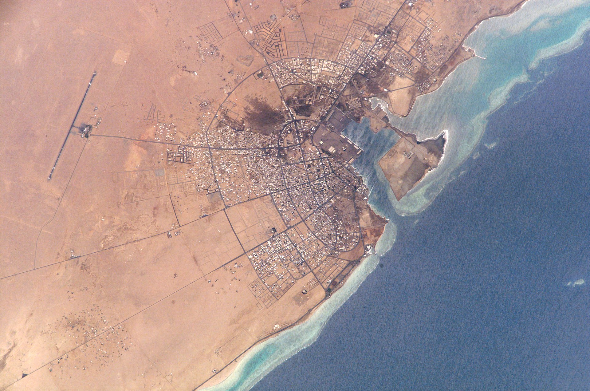 NASA ISS satellite view of Yanbu al Bahr on Saudi Arabia Red Sea coast, terminus of the East-West Pipeline