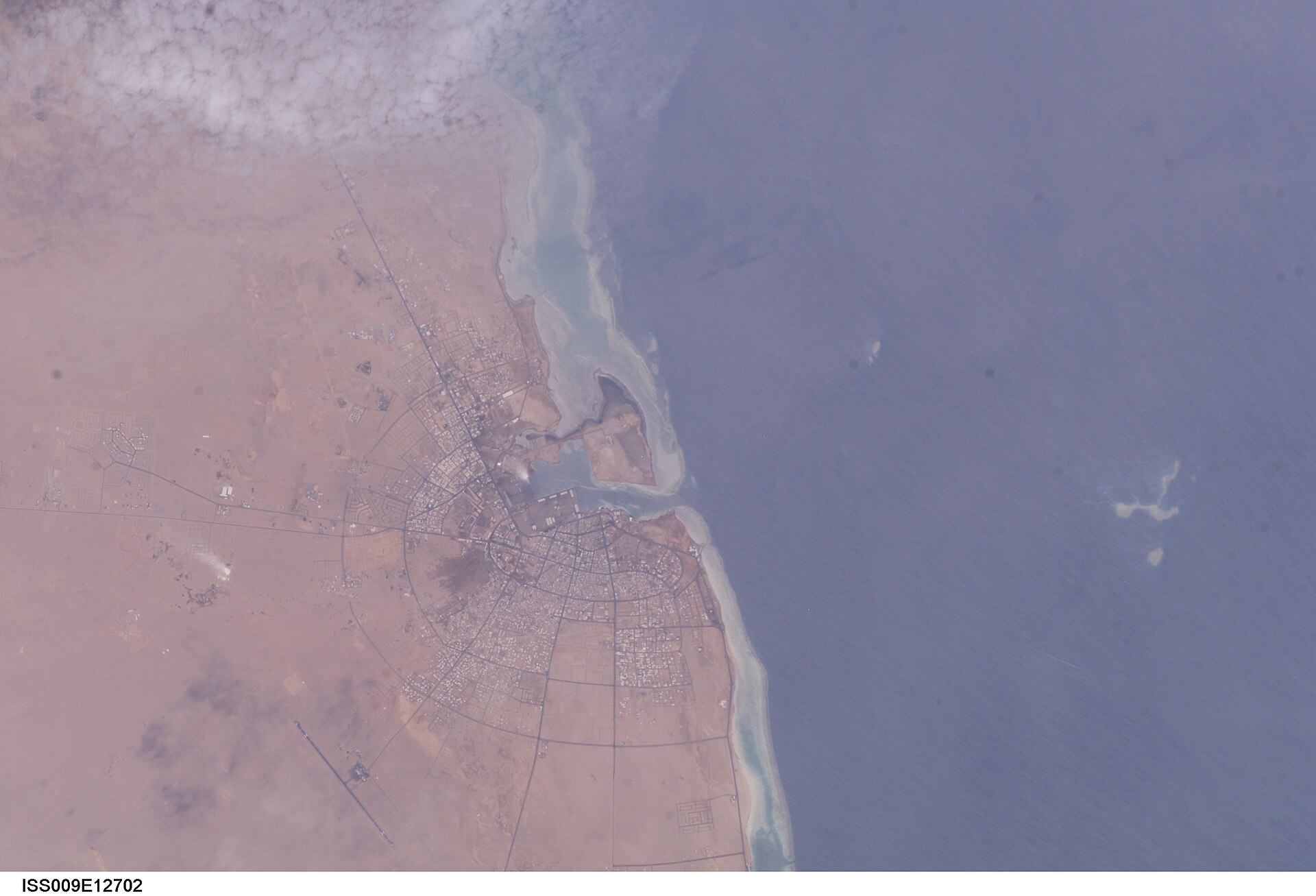 ISS satellite image of Yanbu Al-Sinaiyah industrial city on the Red Sea coast, Saudi Arabia — the terminal through which Saudi Arabia must route oil that previously transited the Strait of Hormuz