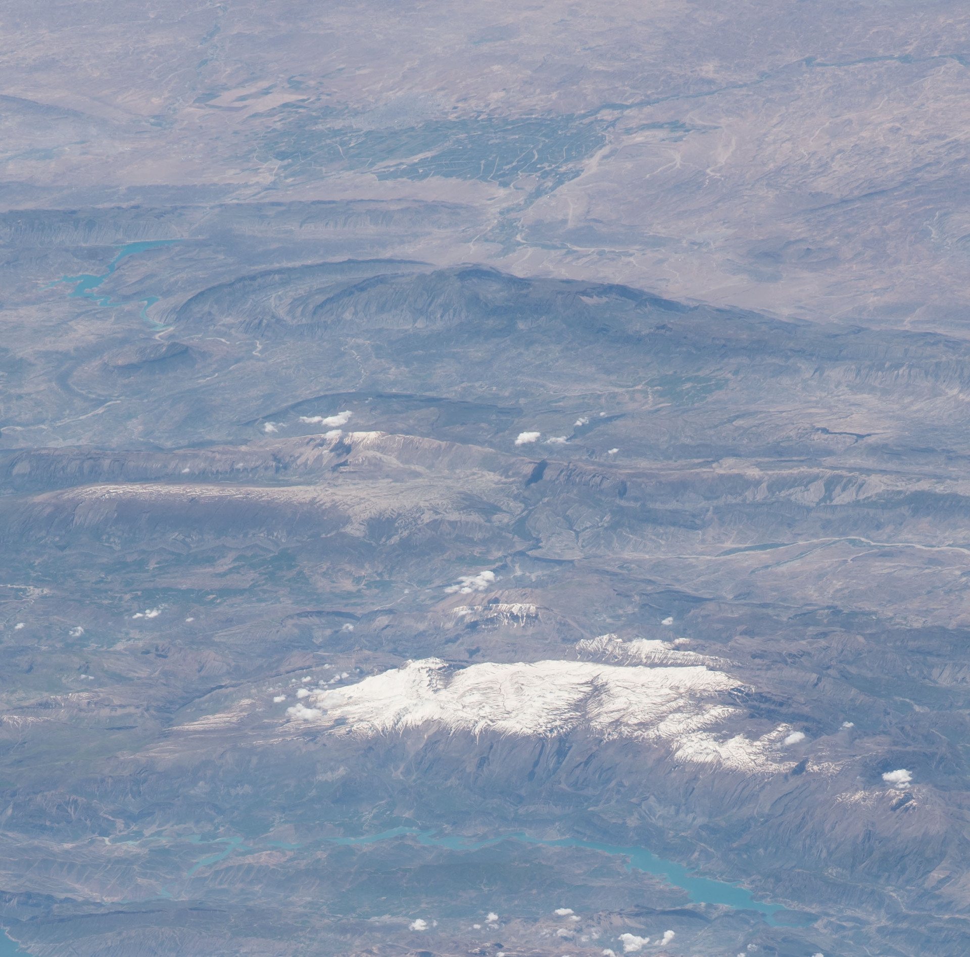 ISS satellite view of the Zagros Mountains in western Iran near Behbahan — the folded mountain terrain where IRGC tunnel complexes and missile cities are embedded