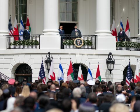 Abraham Accords signing ceremony, South Lawn of the White House, September 15, 2020 — Trump, Netanyahu, and UAE and Bahrain foreign ministers at the podium, US, Israeli, UAE, and Bahrain flags on the portico