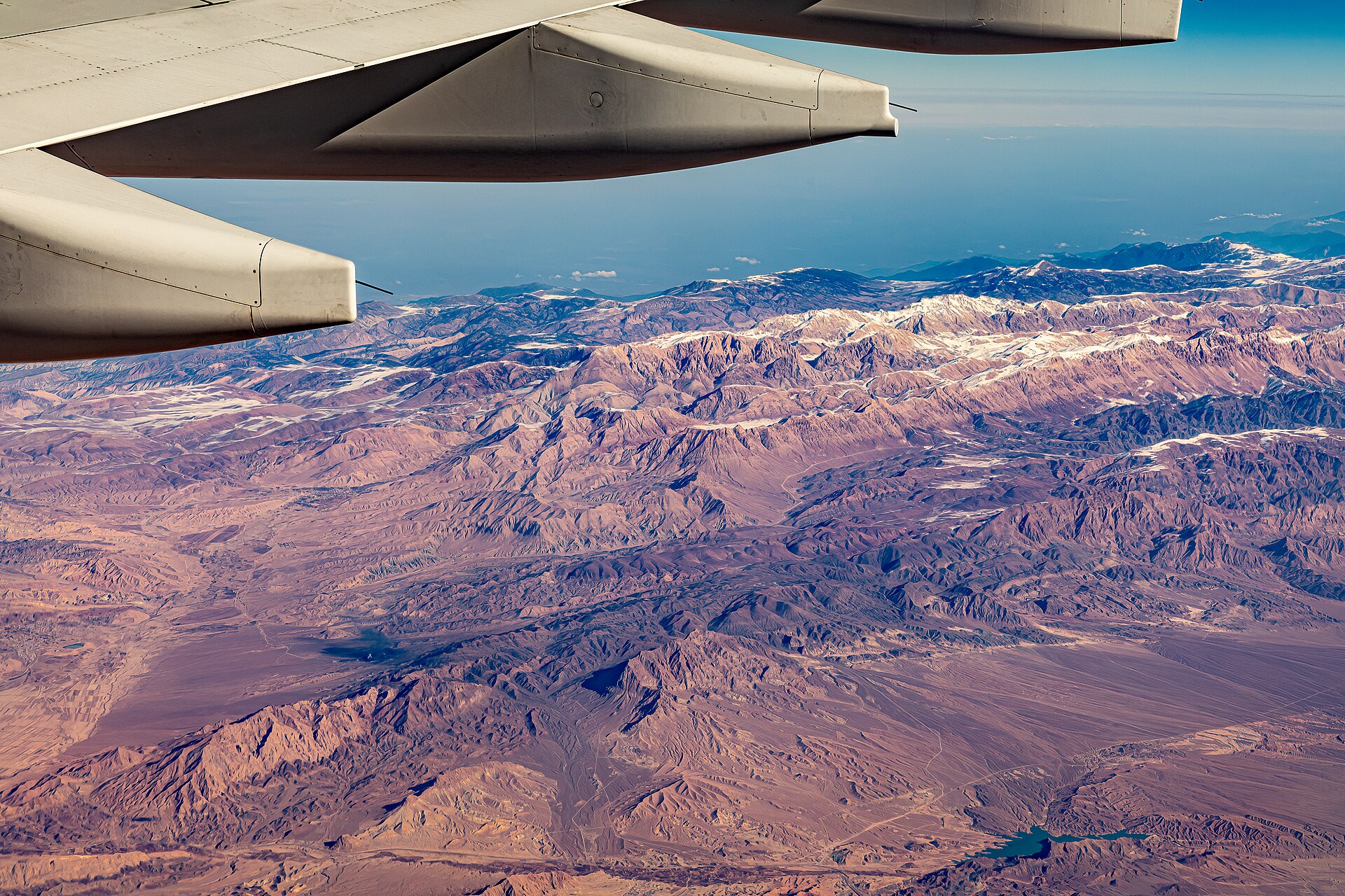 Aerial view of Iran's Alborz Mountains — the rugged terrain that defines the geography of Iran's underground military infrastructure