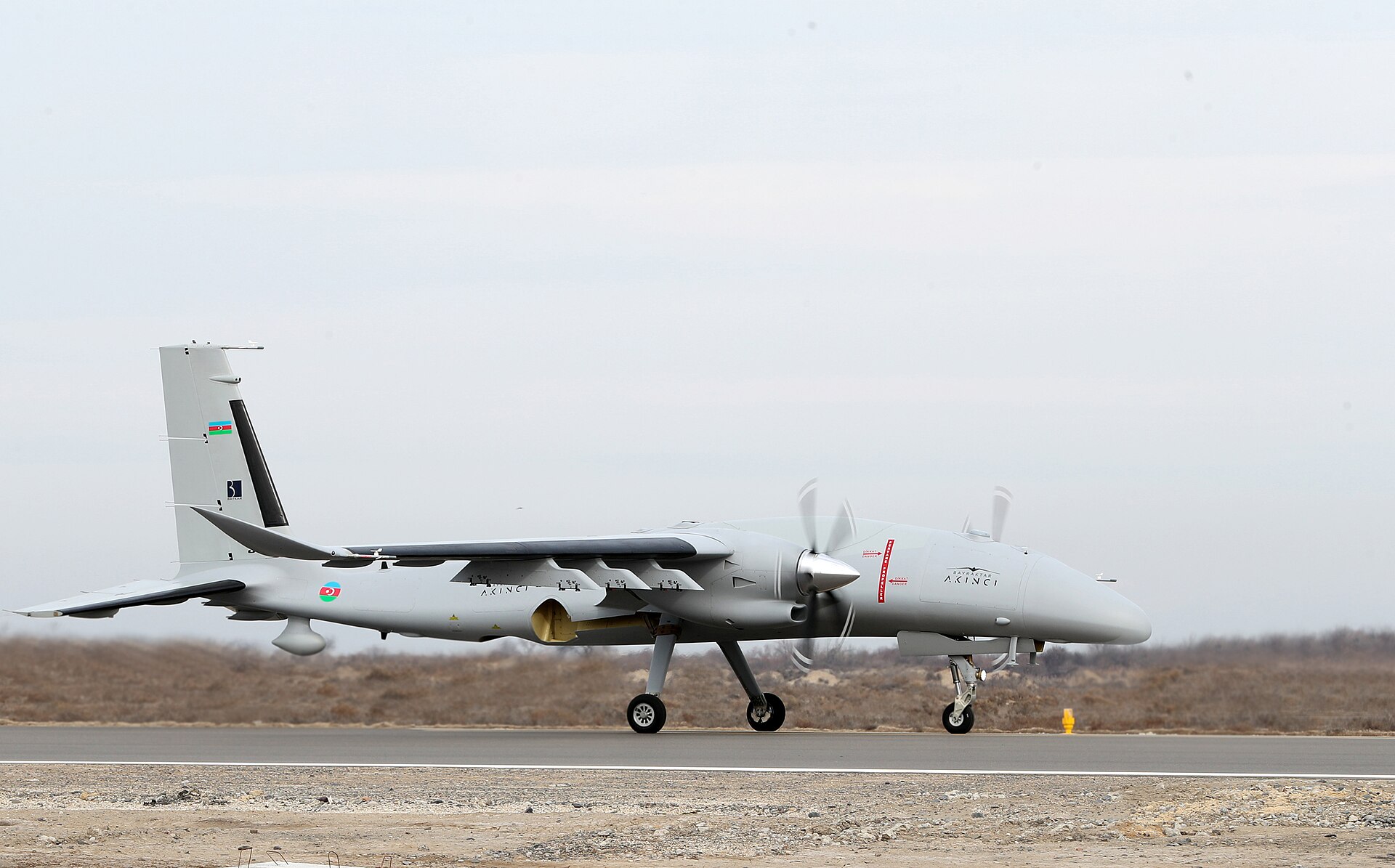 Bayraktar Akinci heavy combat drone of the Azerbaijani Air Force on the runway — Turkey exported $2.2 billion in Baykar armed drones in 2025 to 37 countries, making it the world's fastest-growing major arms exporter
