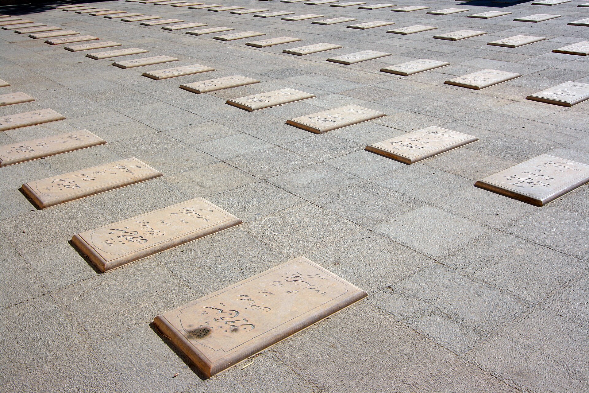 Graves at Beheshte Zahra cemetery in Tehran marking those killed in the July 31, 1987 Mecca incident