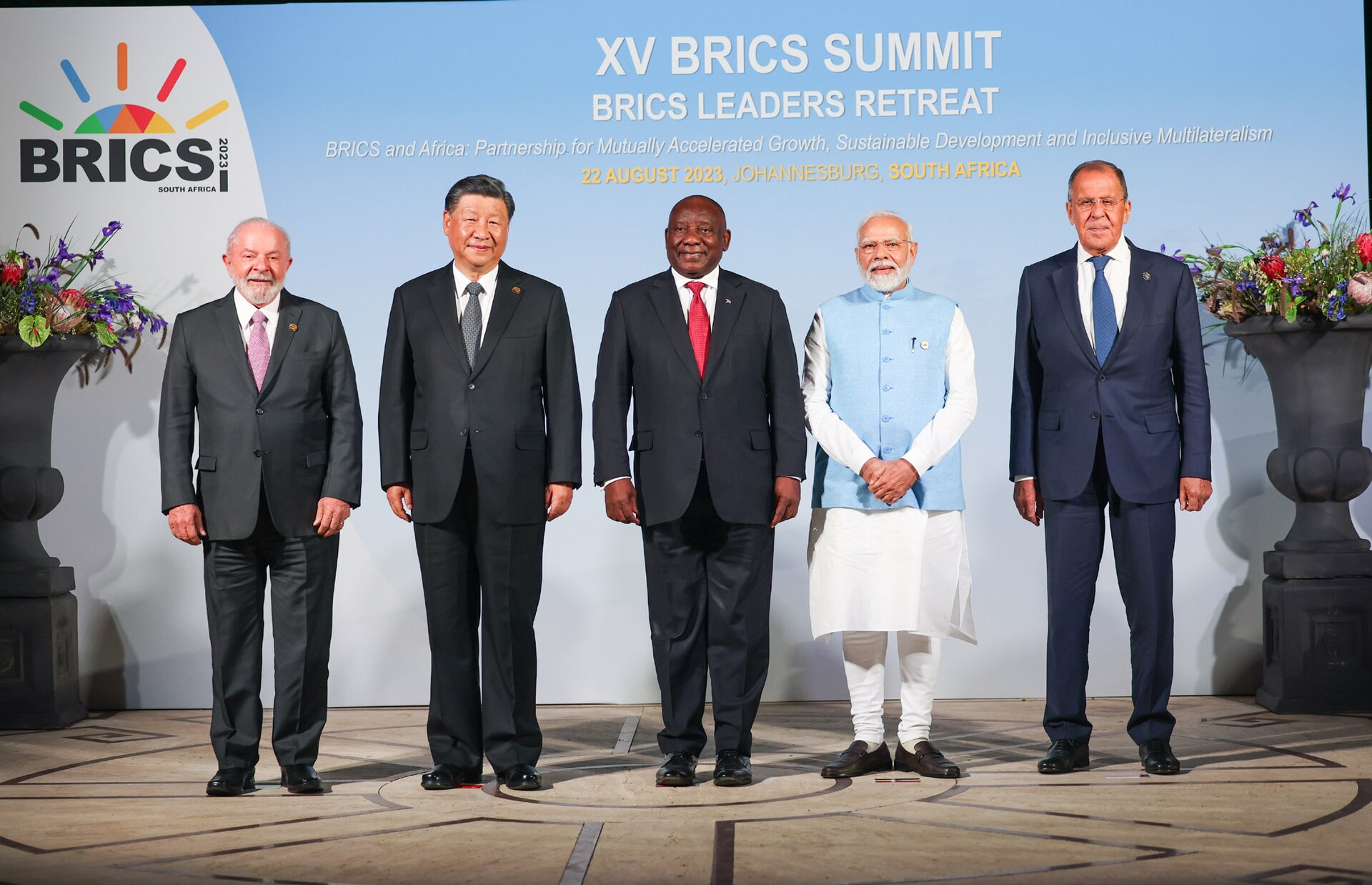 Xi Jinping, Narendra Modi, Sergei Lavrov, Luiz Inácio Lula da Silva and South African President Cyril Ramaphosa at the XV BRICS Summit Leaders Retreat in Johannesburg, South Africa, August 22, 2023 — the last BRICS summit before the forum expanded to include Iran, Saudi Arabia, and the UAE