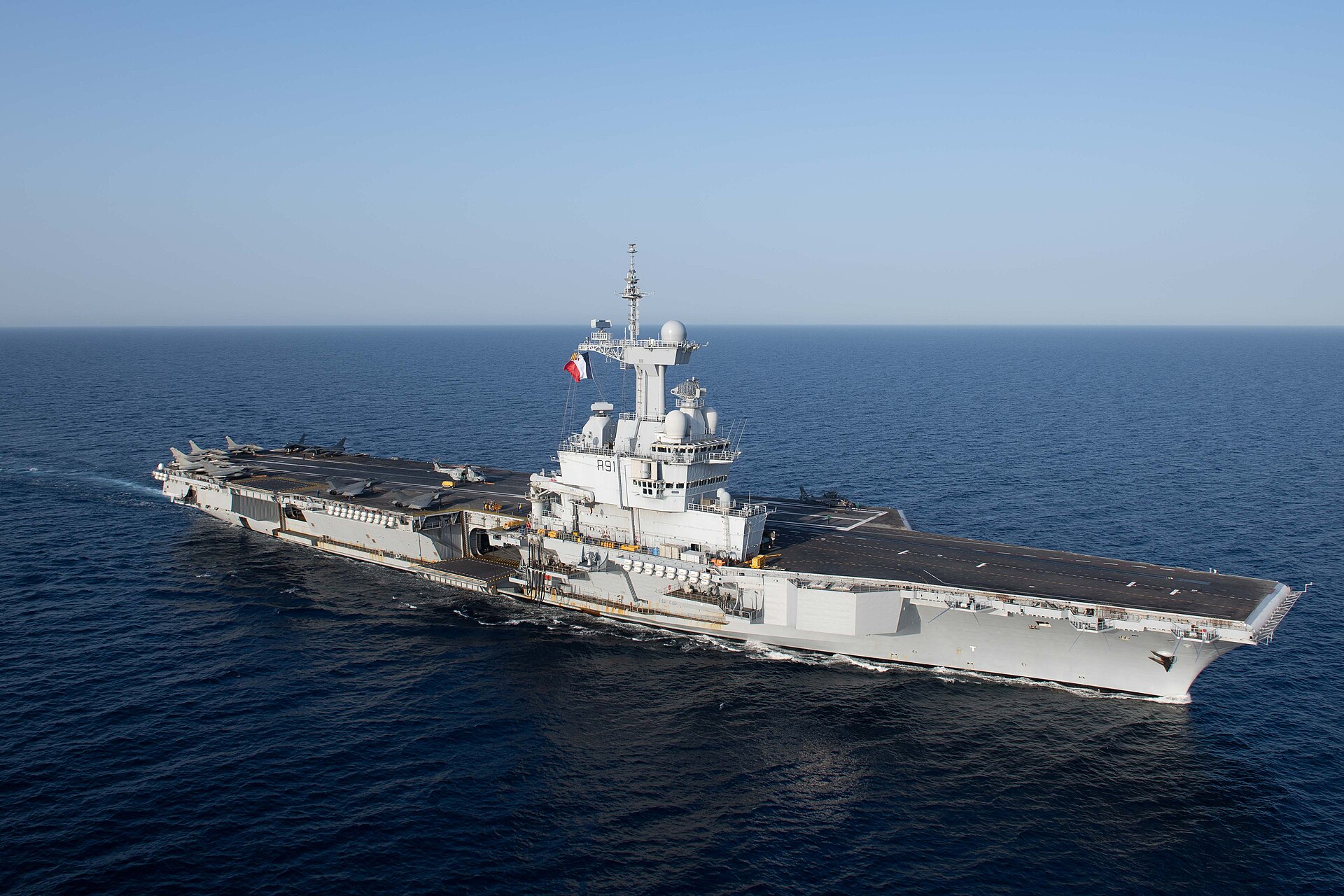 French aircraft carrier Charles de Gaulle (R91) underway in the Red Sea, April 2019, with Rafale jets visible on deck