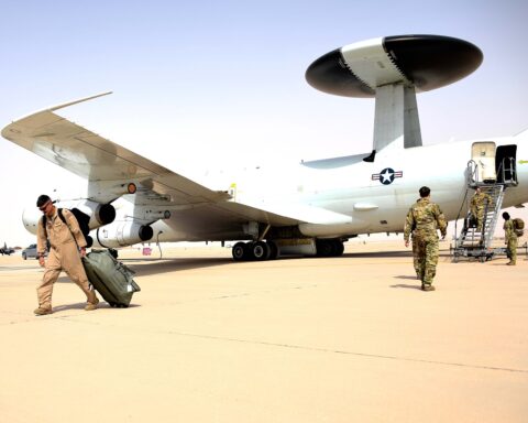 E-3G Sentry AWACS aircrew disembark at Prince Sultan Air Base, Saudi Arabia — the same aircraft type Iran destroyed on March 27, 2026 in a strike that eliminated one of 16 US AWACS platforms