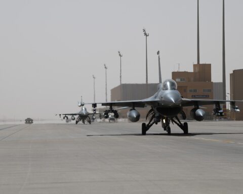 US Air Force F-16 Fighting Falcons taxi on the flight line at Prince Sultan Air Base, Saudi Arabia
