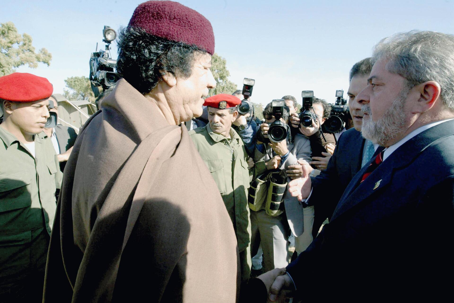 Libyan leader Muammar Gaddafi meets Brazilian President Lula at his Bab al-Aziziya compound in Tripoli, December 10, 2003 — the same month Gaddafi signed the WMD surrender agreement that the IRGC uses as its primary institutional argument against nuclear concessions