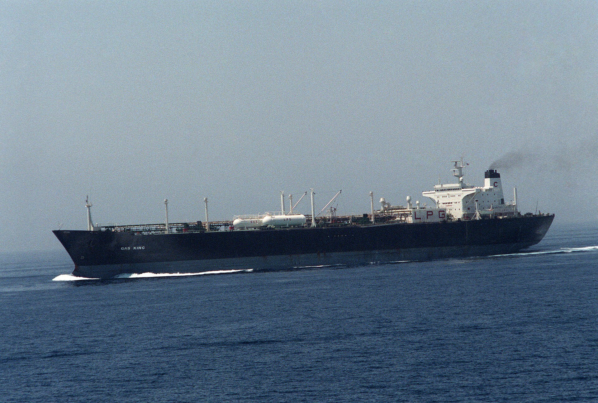 Reflagged Kuwaiti supertanker Gas King underway in the Persian Gulf during Operation Earnest Will, 1987