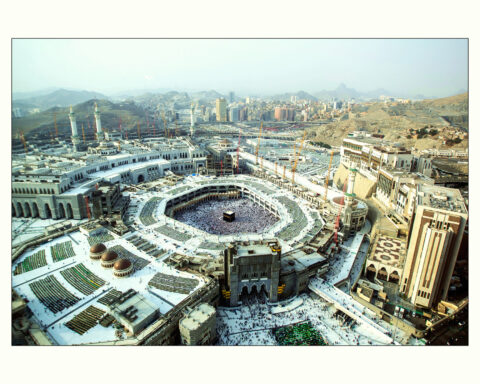Aerial view of the Masjid al-Haram in Mecca, showing pilgrims circling the Kaaba at the centre of the Grand Mosque complex during Hajj season