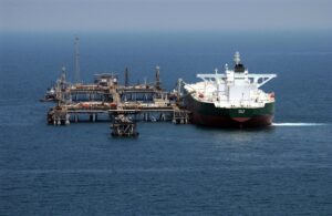 The oil tanker AbQaiq receives crude at Al Basrah offshore terminal in the Arabian Gulf, 2003. US Navy photo.