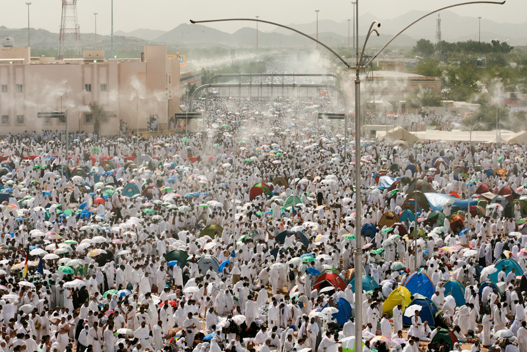 Thousands of Hajj pilgrims in white ihram crowd the plain of Arafat during the Day of Arafah, Saudi Arabia — the annual gathering of up to two million worshippers on a single open plain