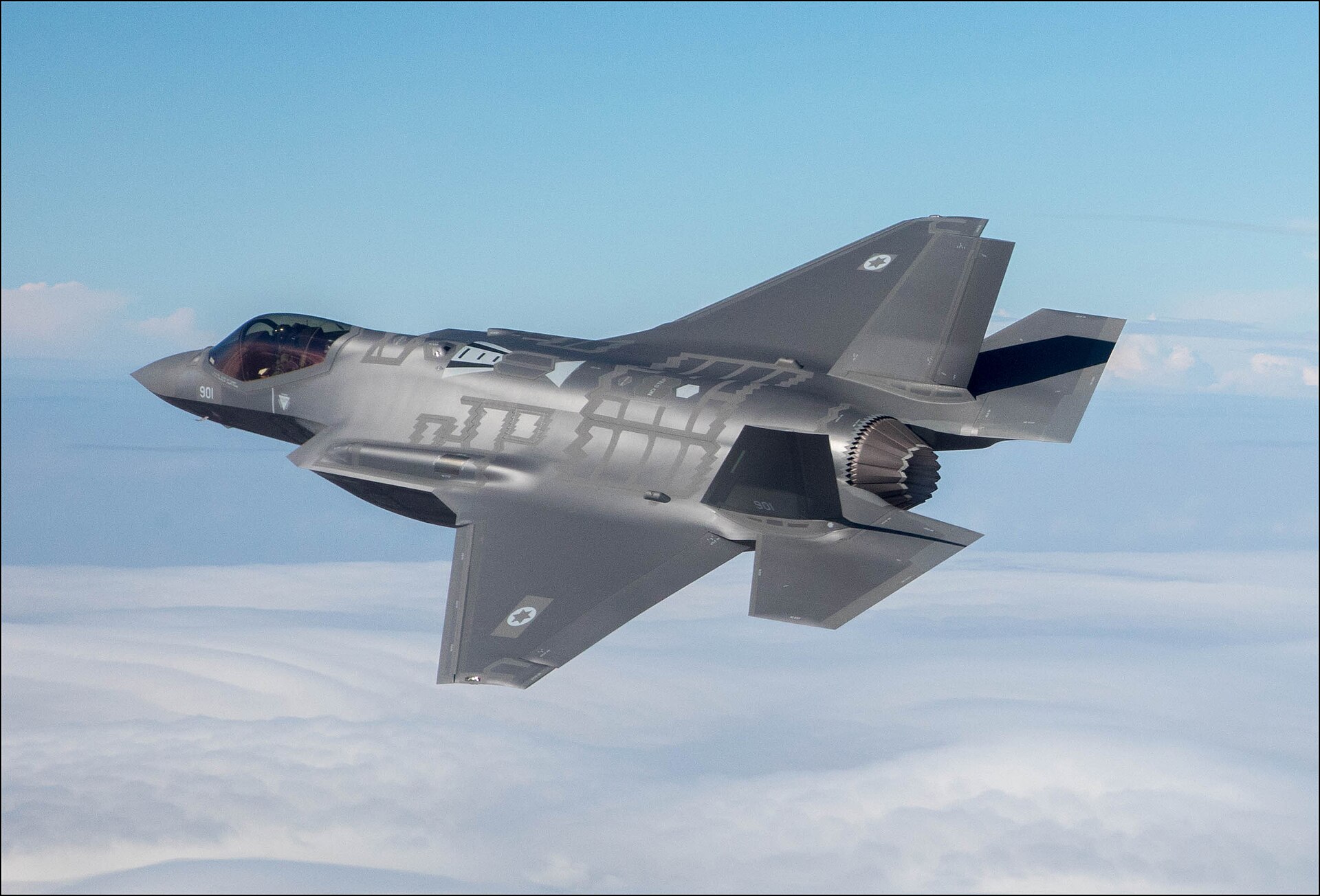 Israeli Air Force F-35I Adir stealth fighter in flight, showing Hebrew markings and Star of David insignia — the aircraft at the centre of Israel's unilateral Iran strike capability