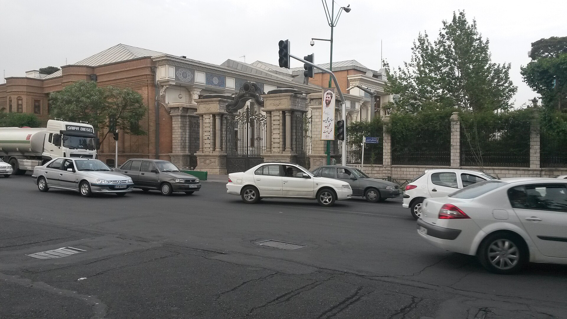 The Iranian Majlis (Islamic Consultative Assembly) building in Tehran — Iran's parliamentary national security and foreign policy committee ratified the 12-article Hormuz sovereignty bill that codifies permanent, country-specific transit denial
