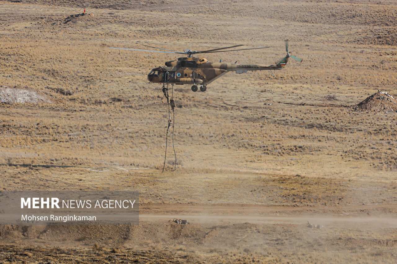 Iranian military helicopter rappelling troops during Sahand Joint Anti-Terrorist Exercise 2025, Mehr News Agency
