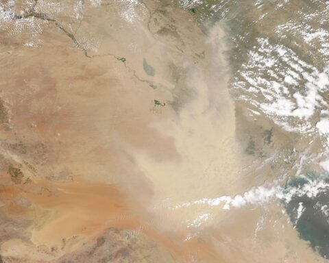 NASA MODIS satellite image of western Iraq and northern Saudi Arabia desert, showing the Anbar desert corridor terrain across which drones have been launched toward Saudi Arabia since February 2026