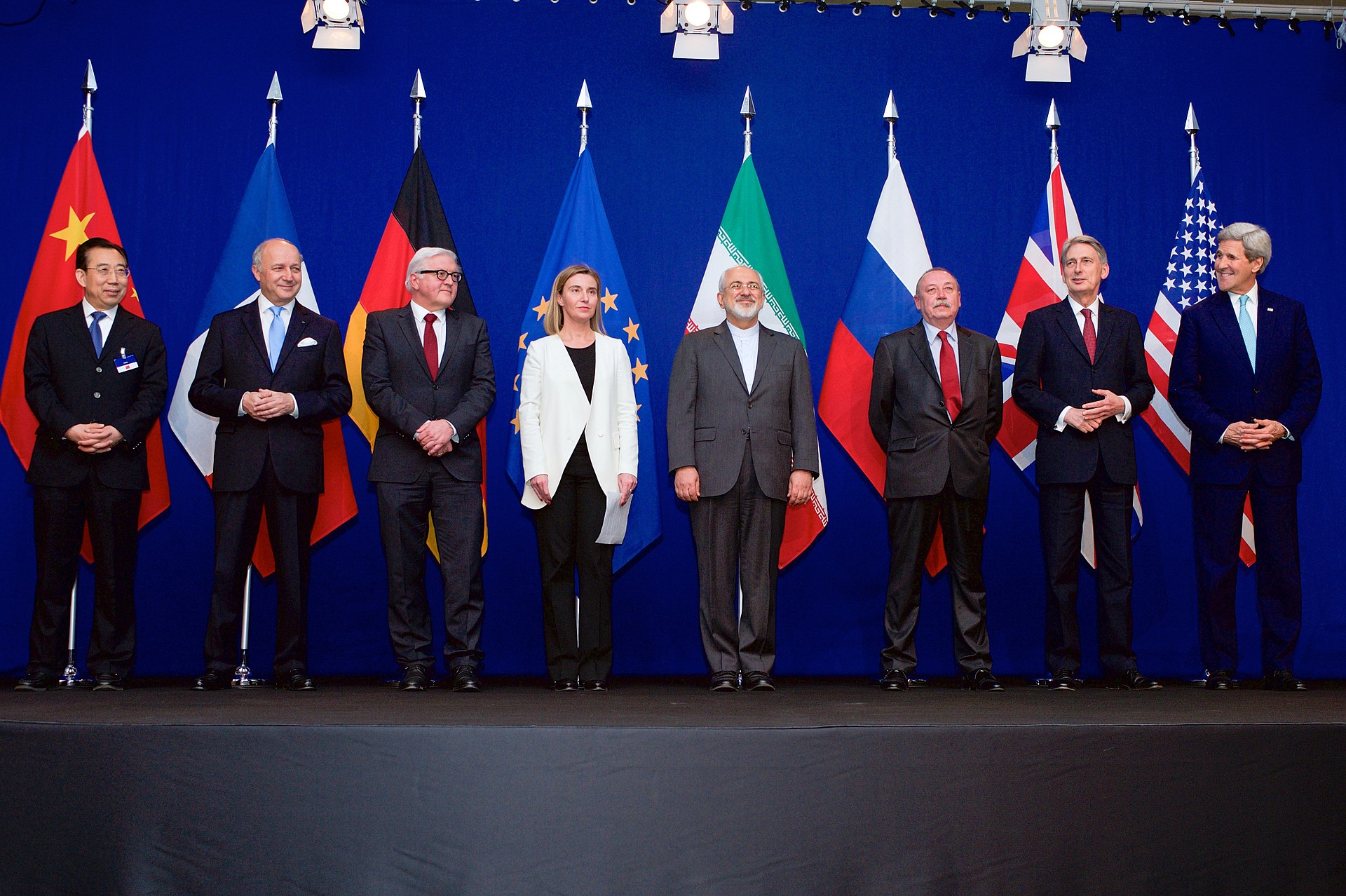 P5+1 and Iranian foreign ministers pose before national flags in Lausanne, Switzerland in April 2015 following the framework agreement that became the Joint Comprehensive Plan of Action