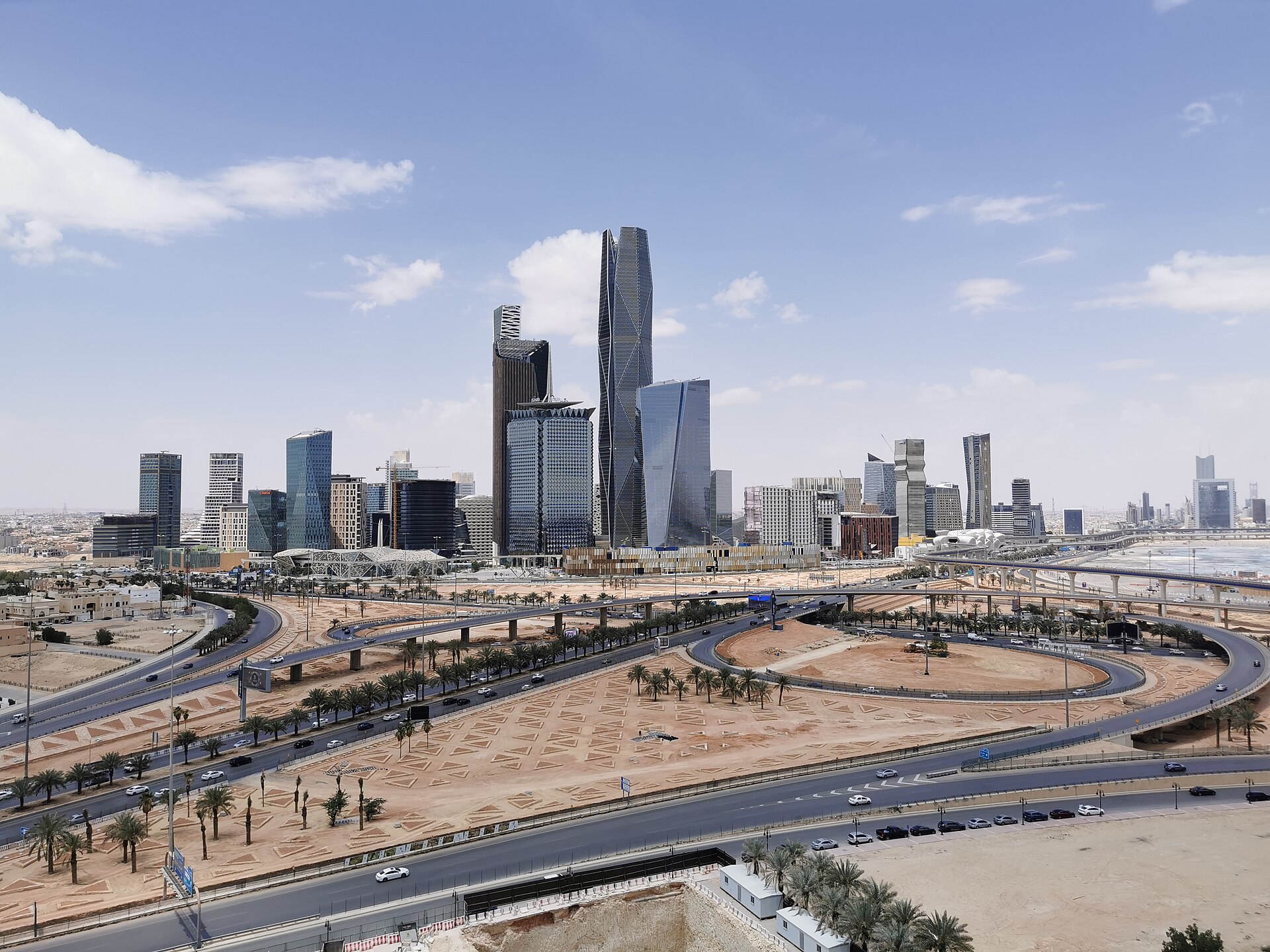 King Abdullah Financial District KAFD Riyadh skyline with modern towers and highway interchange, 2023