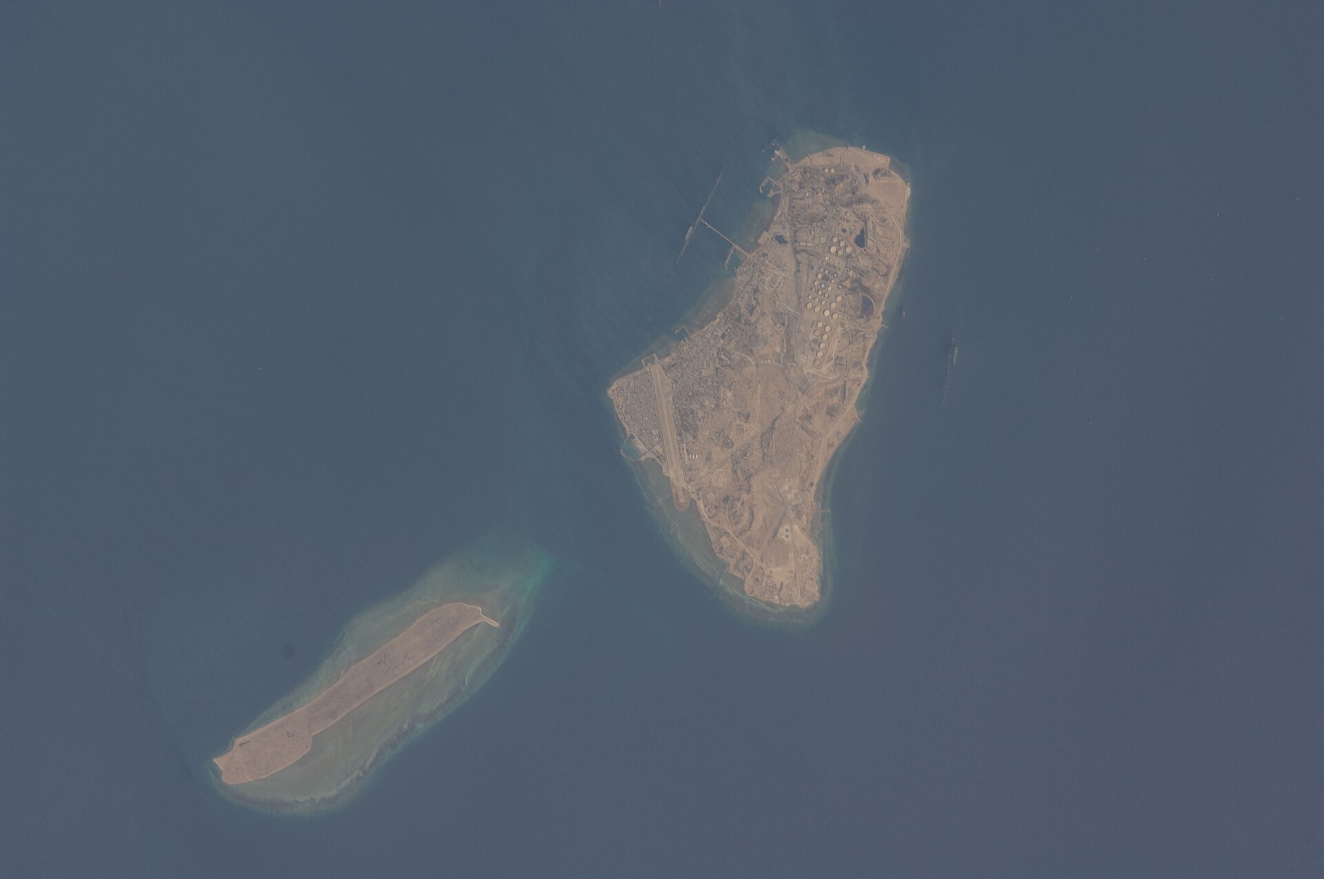 Kharg Island Iran oil terminal from the International Space Station showing storage tanks and tanker jetties