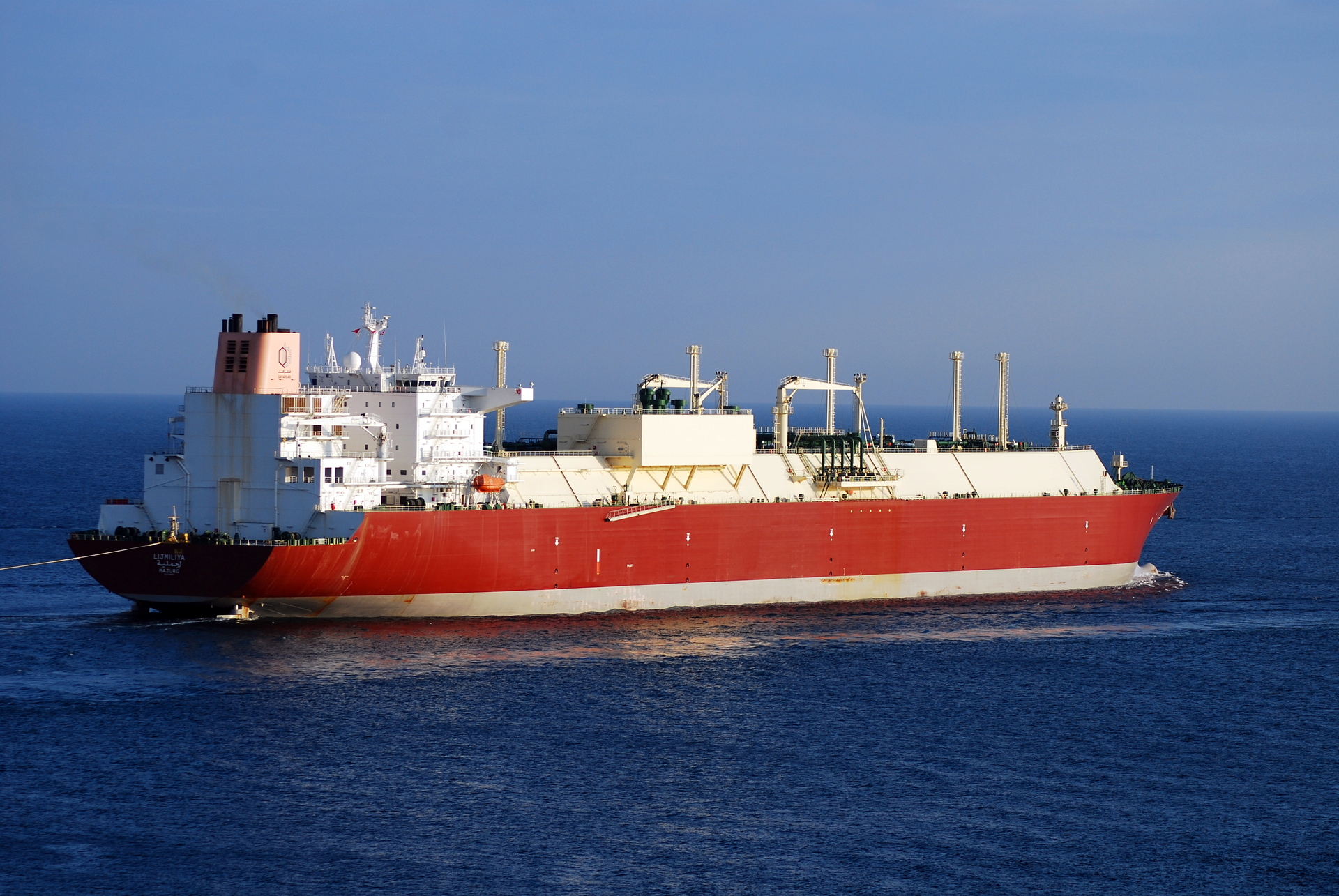 Lijmiliya QatarGas LNG tanker carrier at sea with QatarEnergy Q logo visible on superstructure carrying liquefied natural gas from North Field