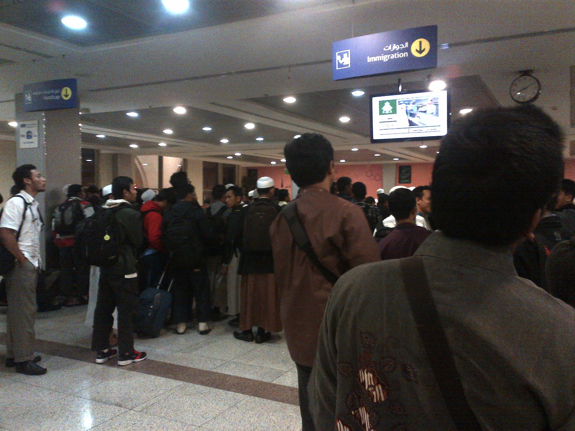 Immigration checkpoint at Prince Mohammad bin Abdulaziz International Airport, Madinah — the entry point for Hajj pilgrims arriving on the Arar air route
