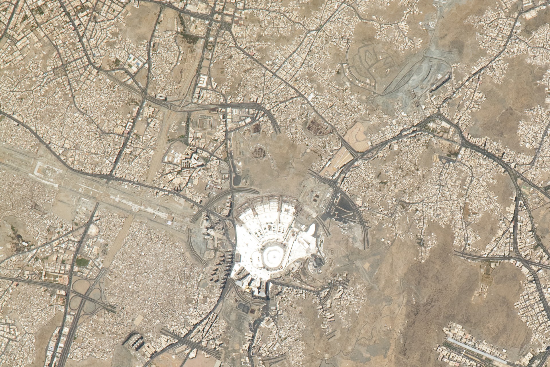 Mecca from the International Space Station, July 2023 — Masjid al-Haram visible at center, where 1.2-1.5 million Hajj pilgrims will concentrate on May 26 under a Saudi air defense umbrella with 400 PAC-3 rounds remaining