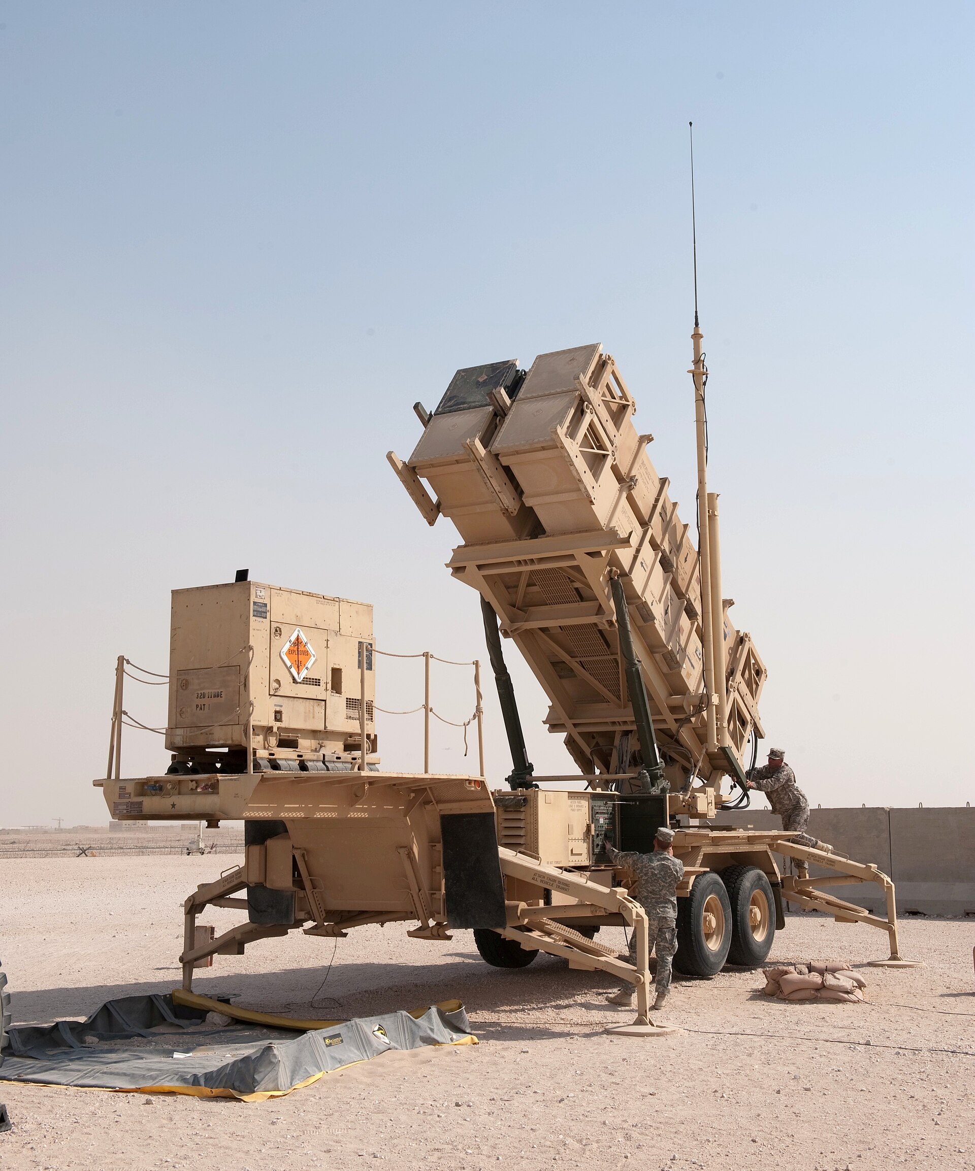 MIM-104 Patriot surface-to-air missile launcher deployed in a desert environment, the system used by UAE and Saudi Arabia to intercept Iranian ballistic missiles and drones