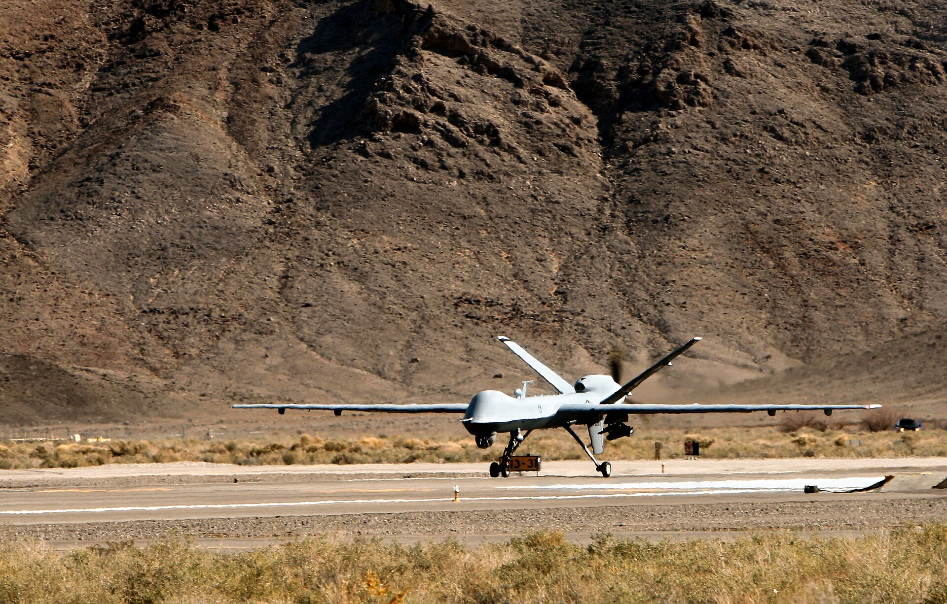 MQ-9 Reaper on the runway at Creech Air Force Base, Nevada — the 432nd Wing home of US drone operations. The Air Force is seeking a replacement under the Attritable ISR Aircraft program, with first deliveries no earlier than 2029. Photo: USAF / Public Domain
