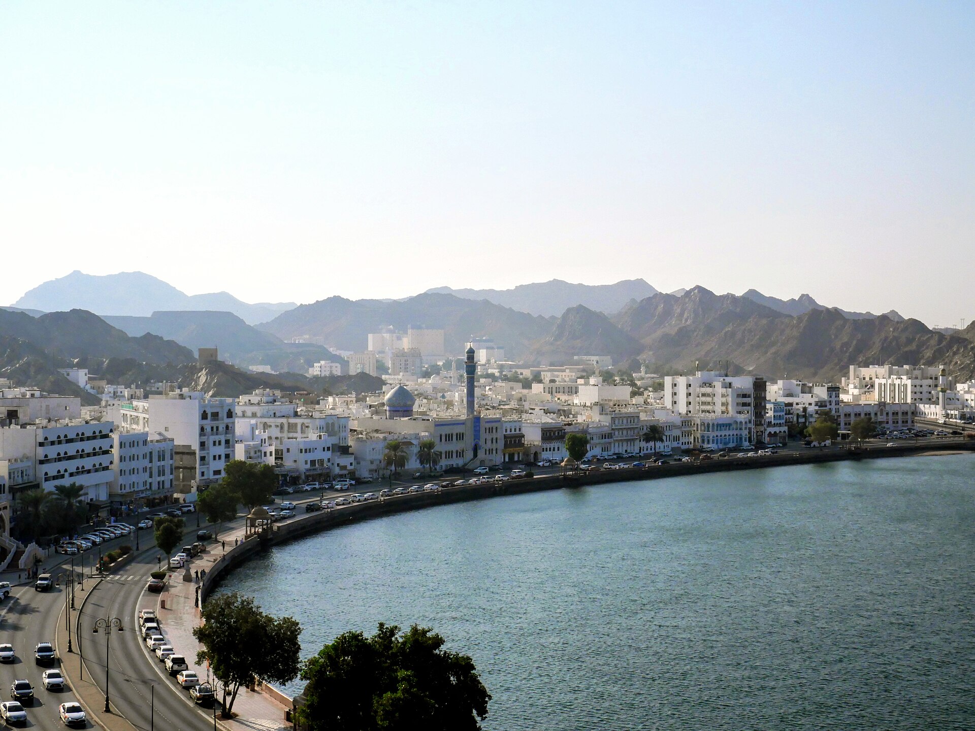 Aerial view of Muttrah harbor, Muscat, Oman — the diplomatic capital where Iranian and Omani officials met May 13 to discuss sovereign rights over the Strait of Hormuz