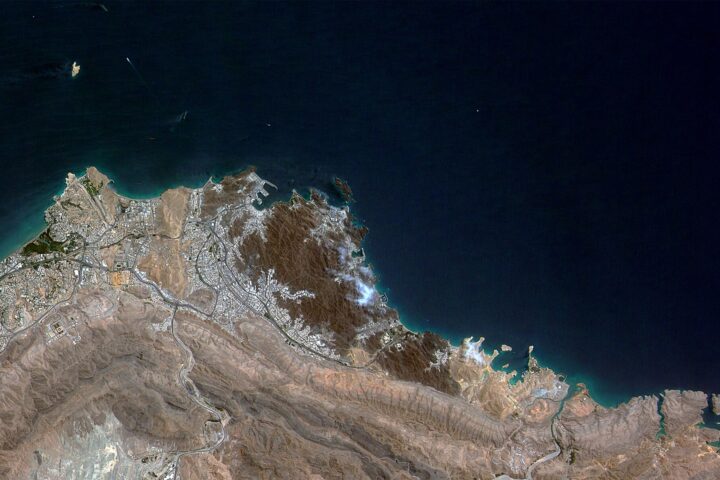Satellite view of Muscat, Oman — the Gulf capital where four rounds of US-Iran indirect nuclear talks have been hosted by Omani Foreign Minister Badr al-Busaidi