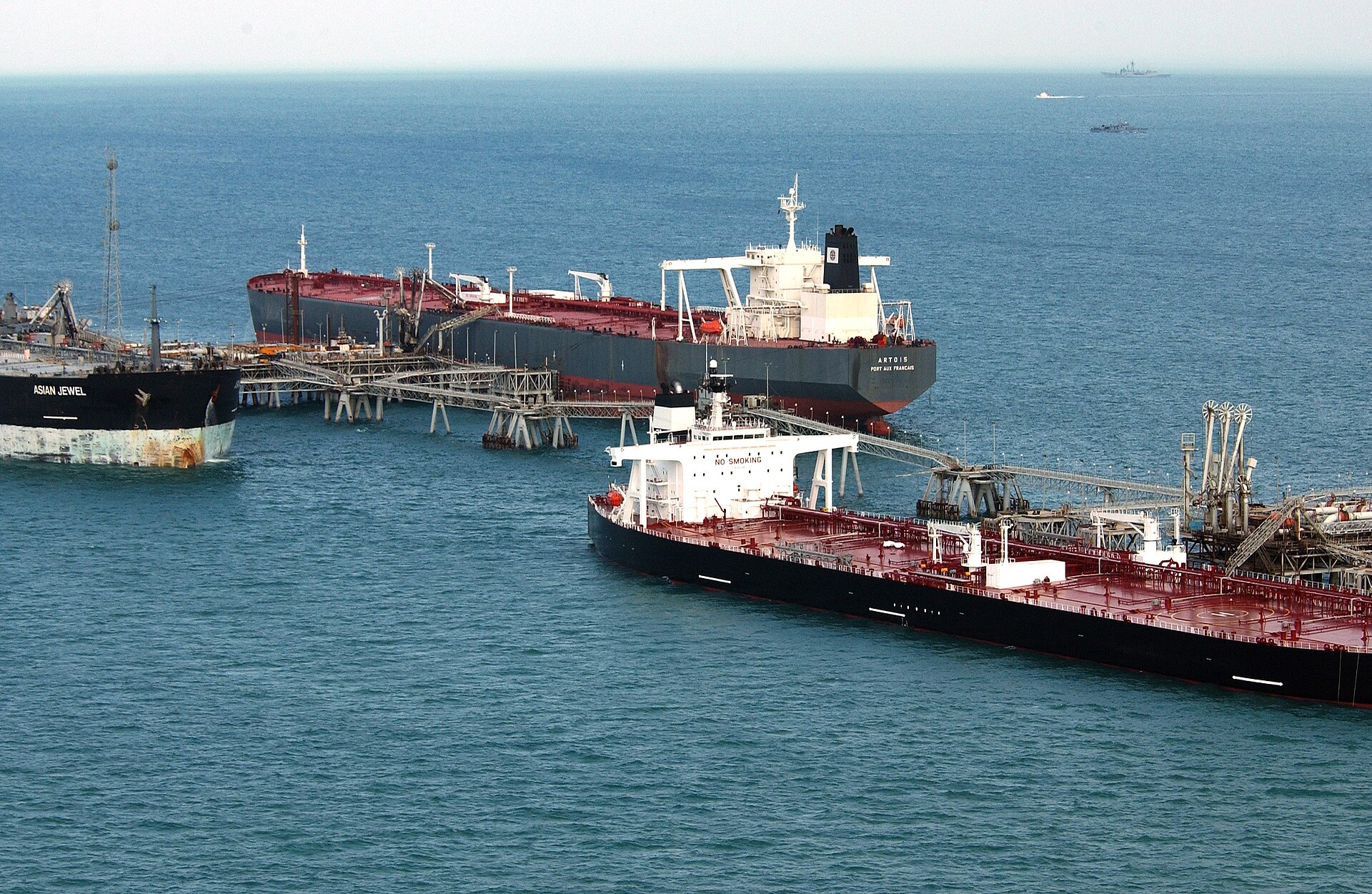 Multiple oil tankers loading at the Al Basra Oil Terminal in the northern Arabian Gulf, illustrating Gulf crude export infrastructure dependent on Hormuz transit